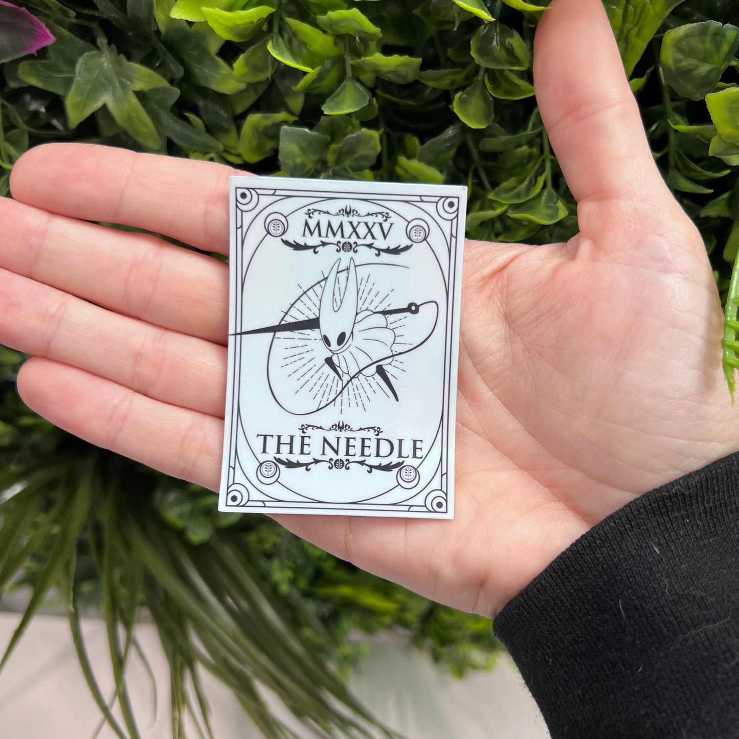 Silver Holographic tarot card stickers featuring Hollow Knight as The Nail and Hornet as the Needle. Unique indie game fan art collectible.