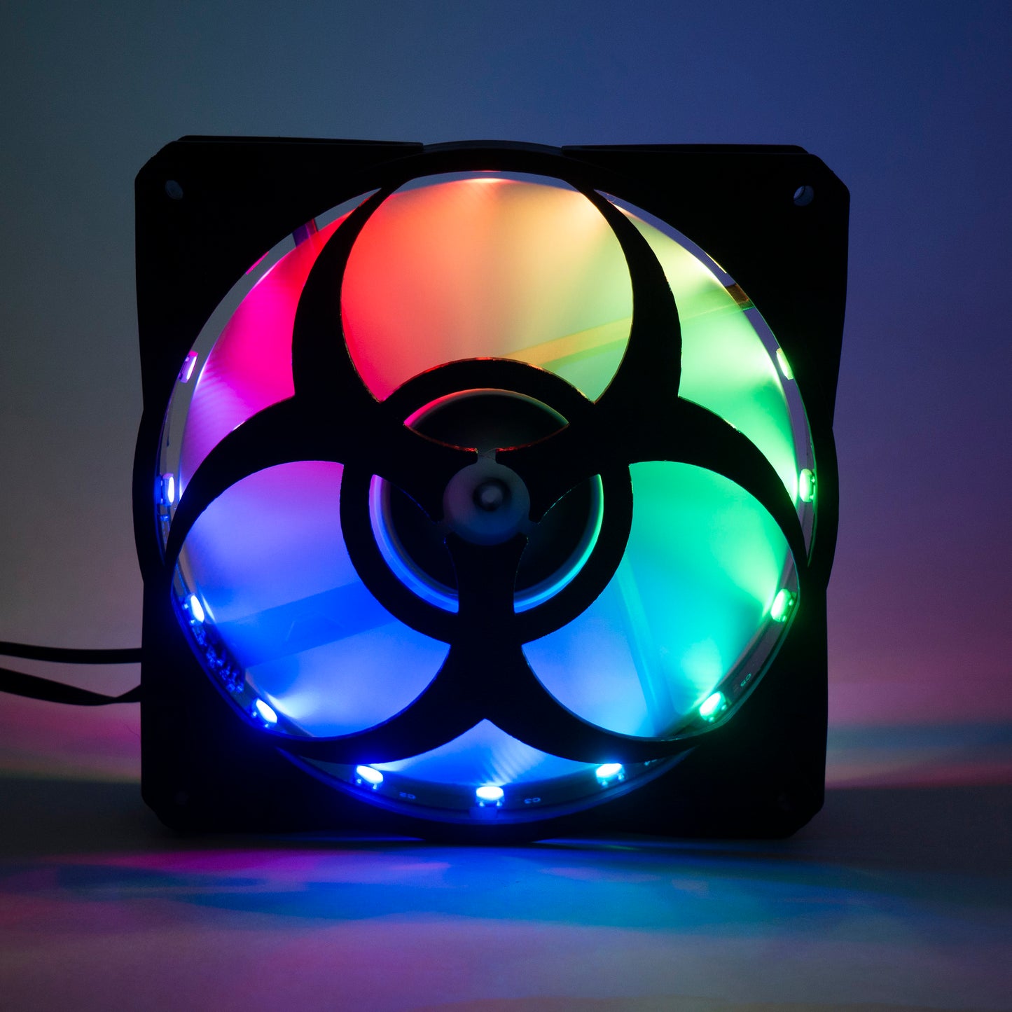 3D printed PC fan grill featuring a bold biohazard symbol. Perfect for custom gaming rigs, PC case mods, and fans of edgy, nerdy, or horror-inspired builds.