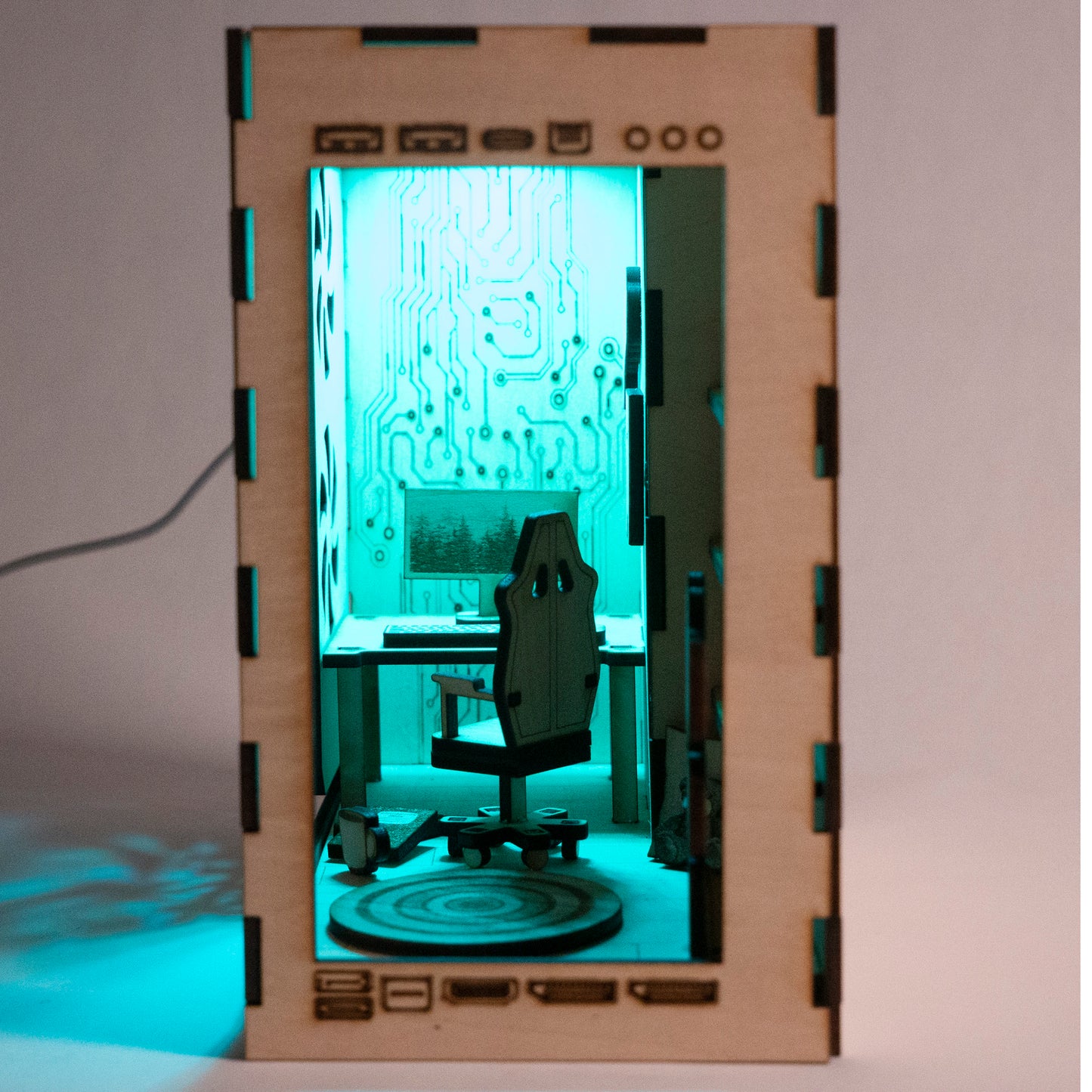 DIY gaming PC book nook kit made from laser-engraved basswood with LED light and remote. A perfect gamer gift and bookshelf insert for tech lovers.