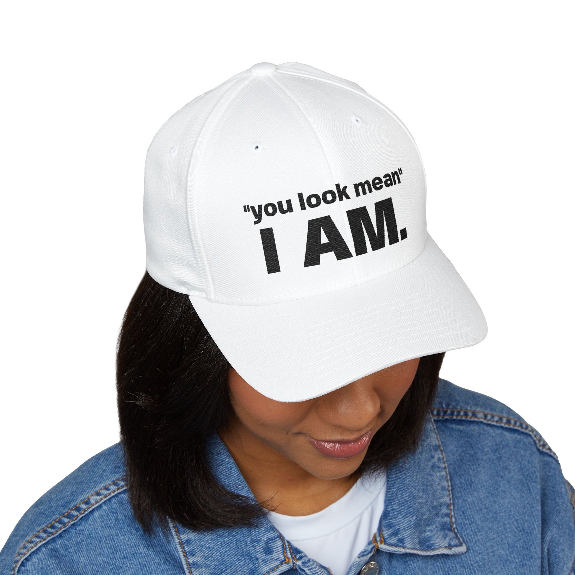 Hat embroidered with “You look mean” and “I am.” text.