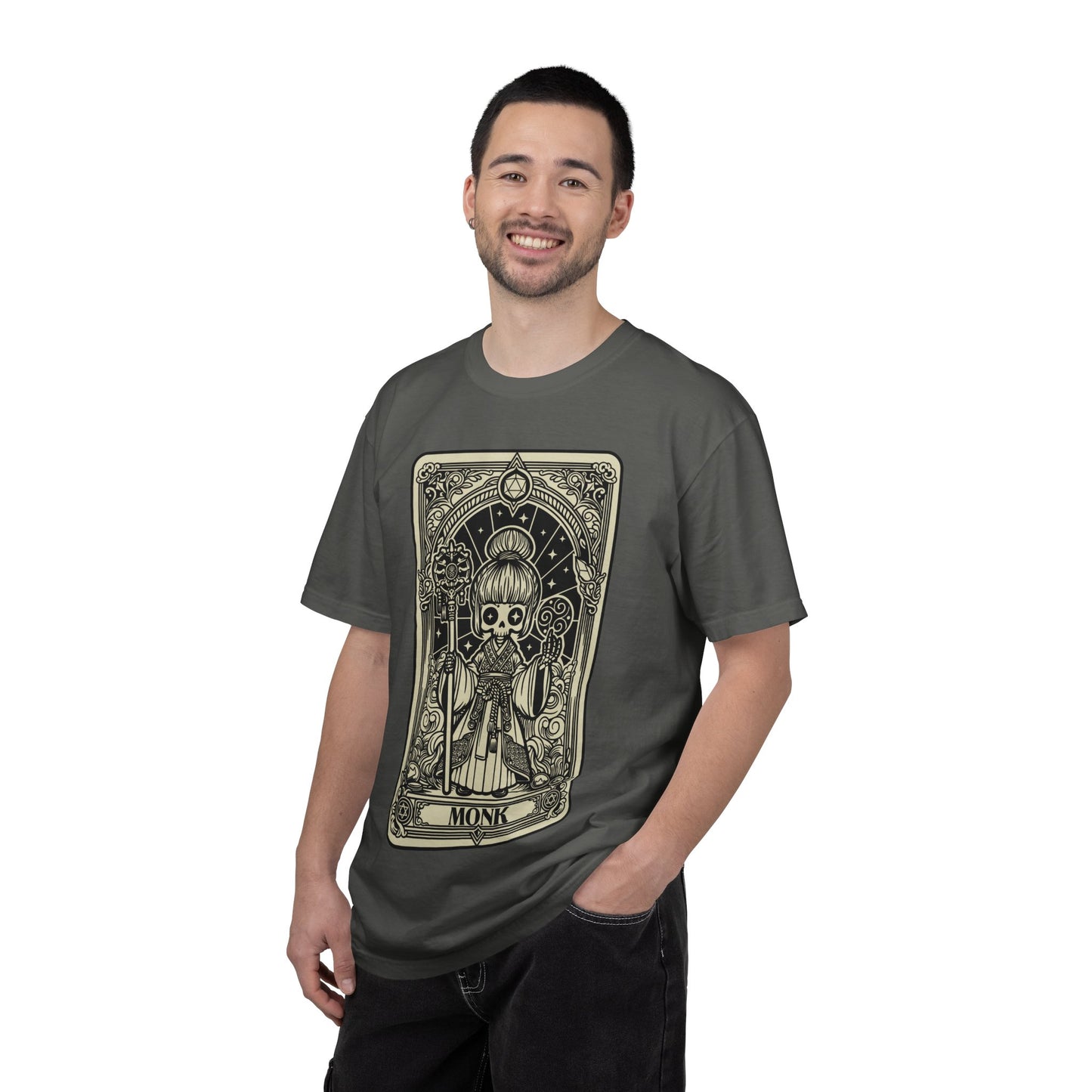 Man wearing a gray t-shirt with a graphic Monk design on a white background