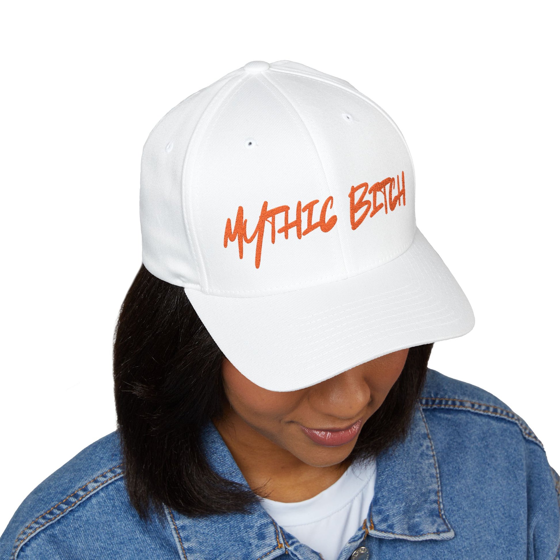Baseball cap embroidered with “mythic bitch”.