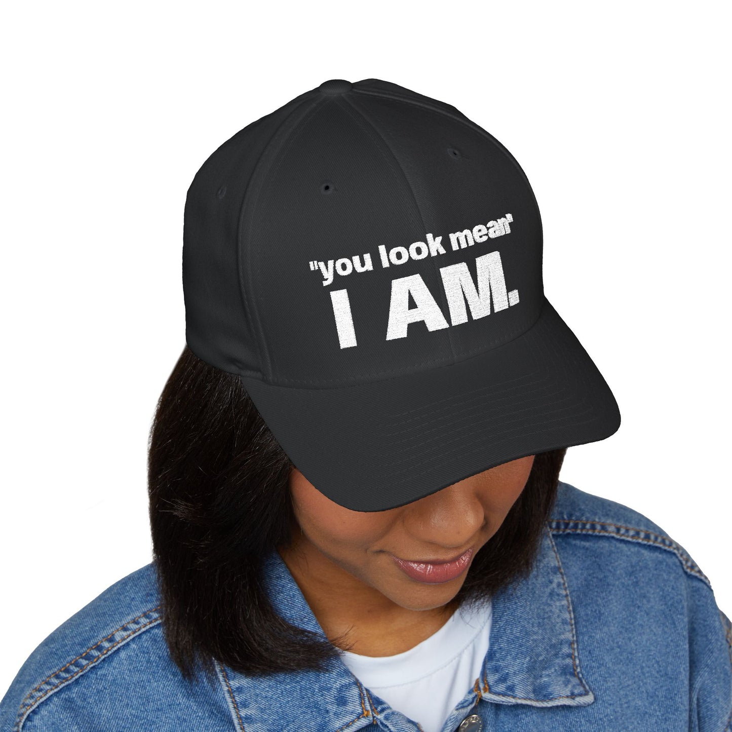 Hat embroidered with “You look mean” and “I am.” text.