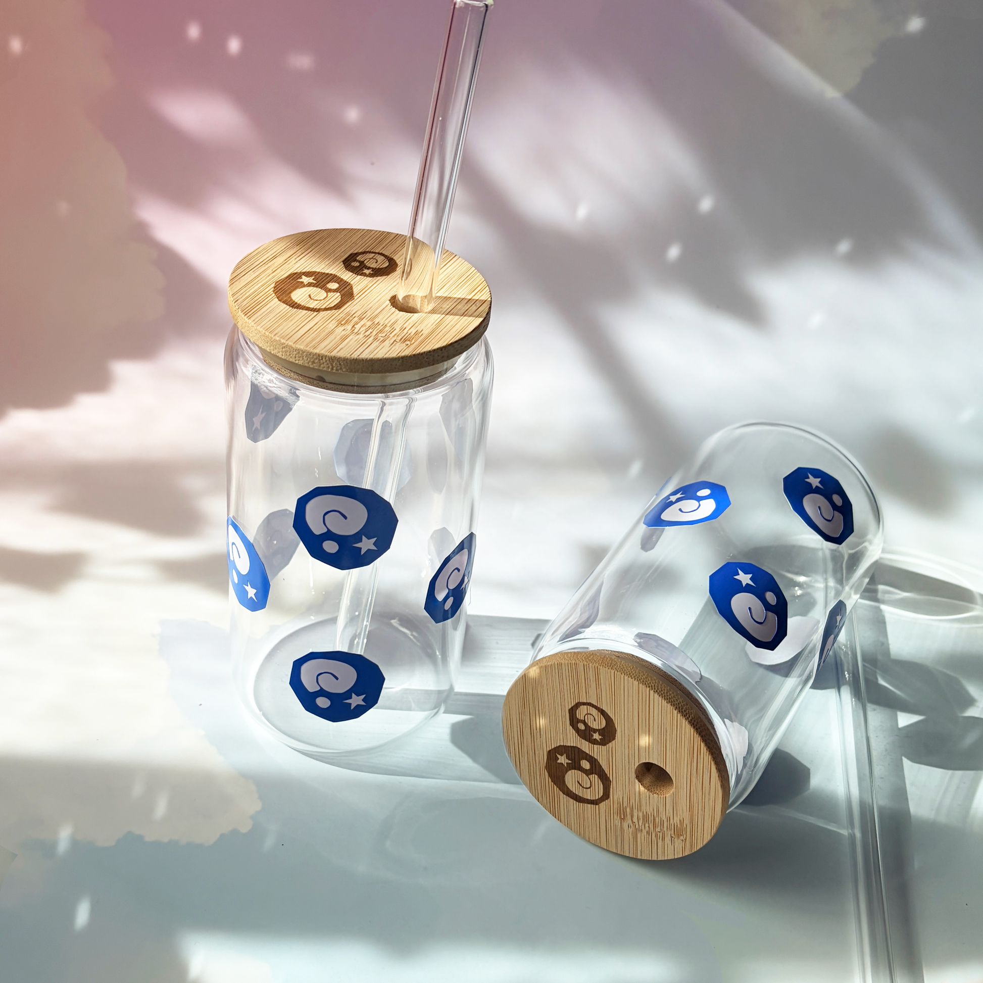 Glass tumbler with bamboo lid featuring Animal Crossing inspired fossil designs.