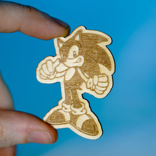 Laser engraved wooden pin featuring Sonic the Hedgehog, perfect for retro gaming fans, handmade geek gifts, or collectors of nostalgic video game merch.
