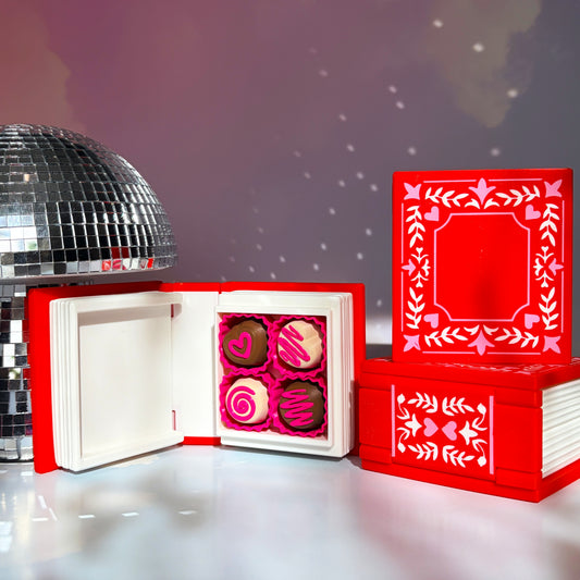 Valentine themed book fidget clicker with chocolate box interior.