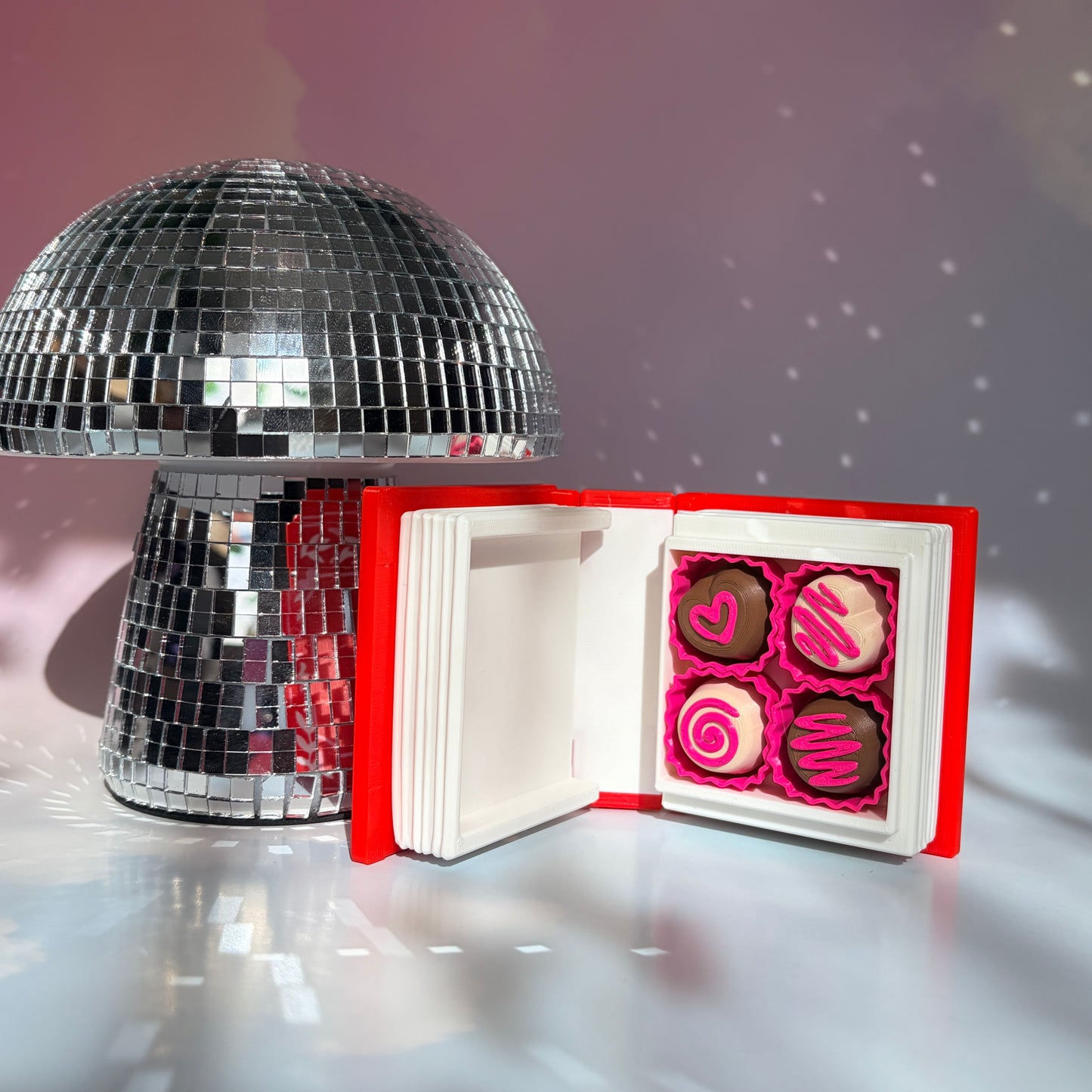 Valentine themed book fidget clicker with chocolate box interior.