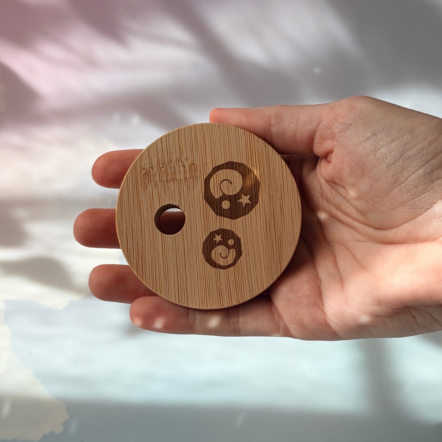 Glass tumbler with bamboo lid featuring Animal Crossing inspired fossil designs.
