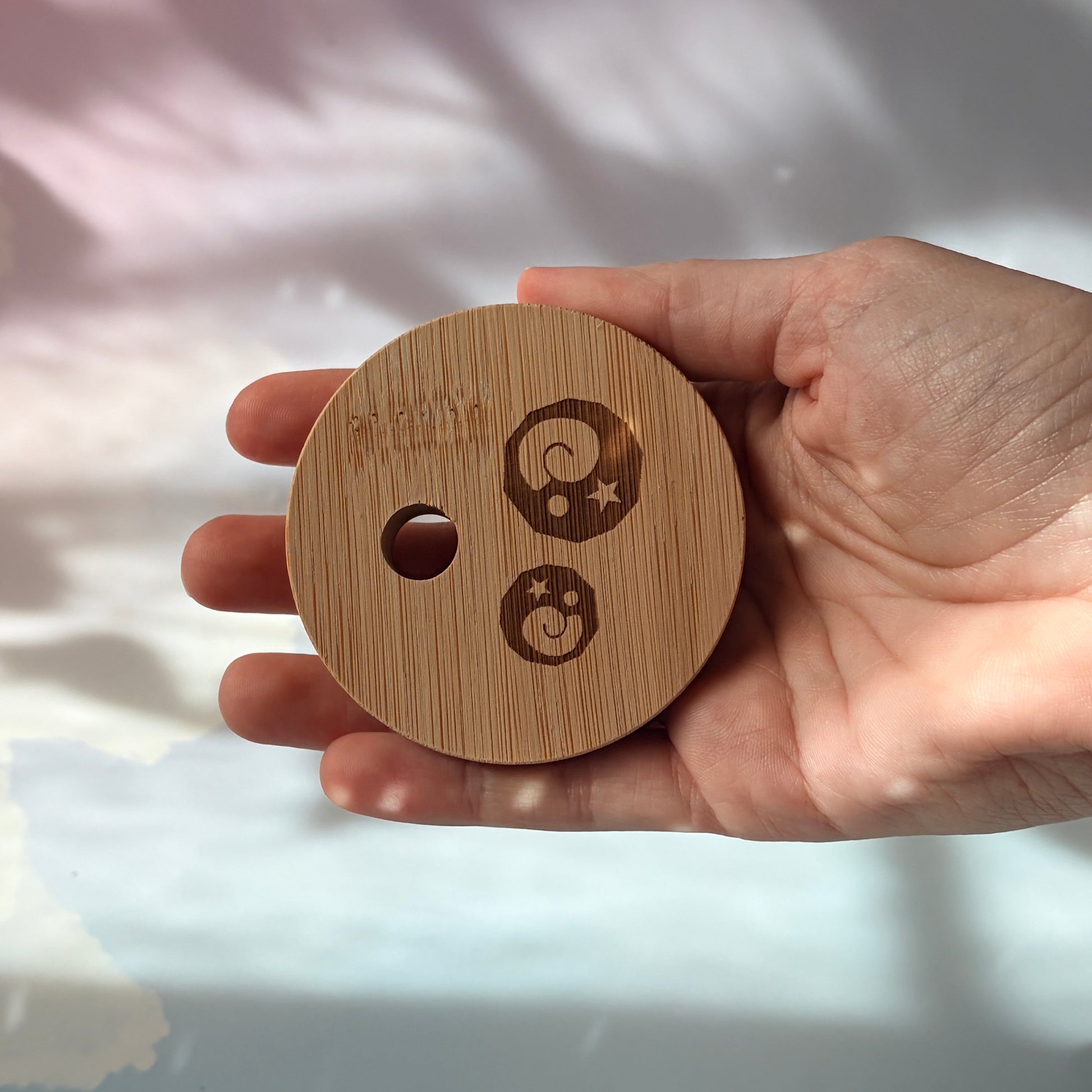 Glass tumbler with bamboo lid featuring Animal Crossing inspired fossil designs.