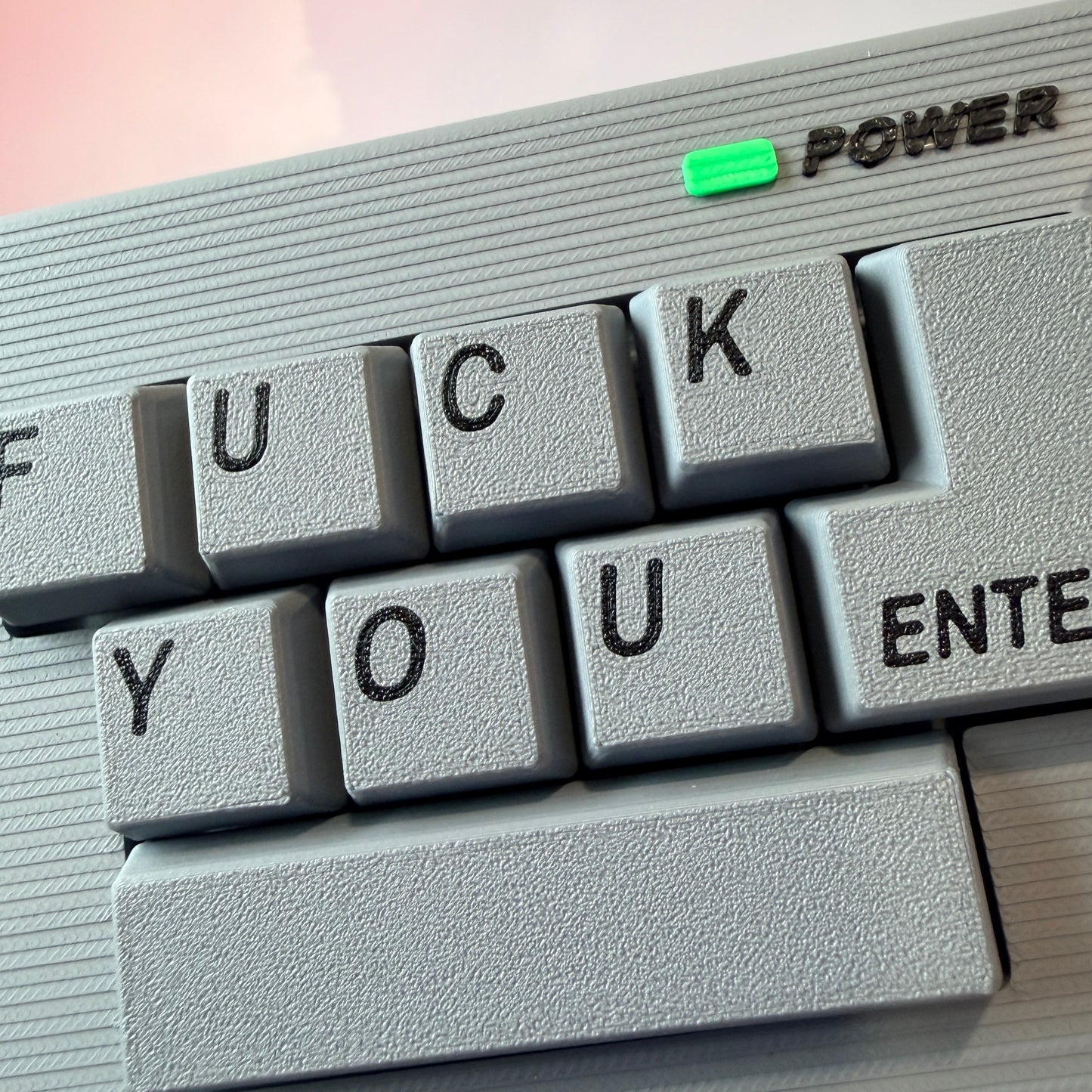 Gray 10-key fidget clicker Fuck You Mini Keyboard