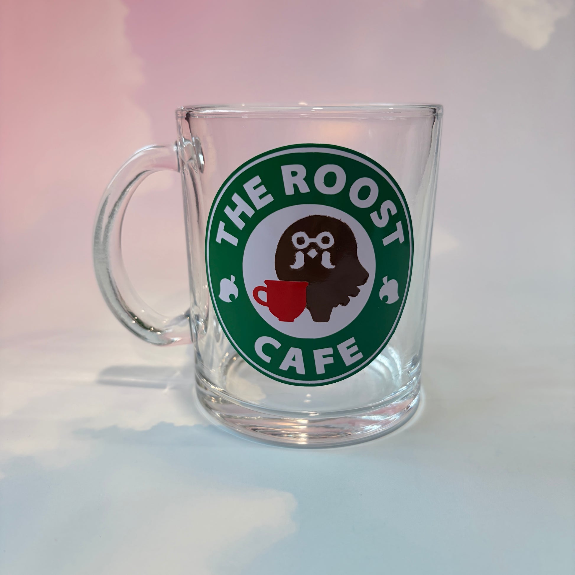 Glass coffee cup with Roost Café inspired vinyl logo.