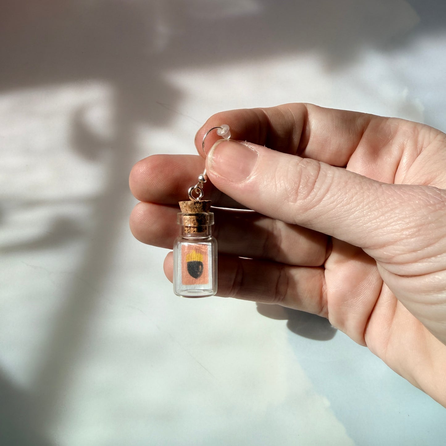 Animal crossing new horizons mini message in a bottle earrings with sterling silver hooks. 