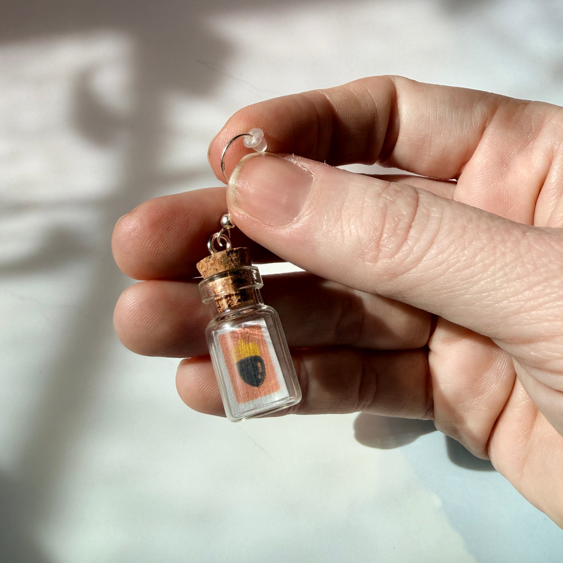 Animal crossing new horizons mini message in a bottle earrings with sterling silver hooks. 