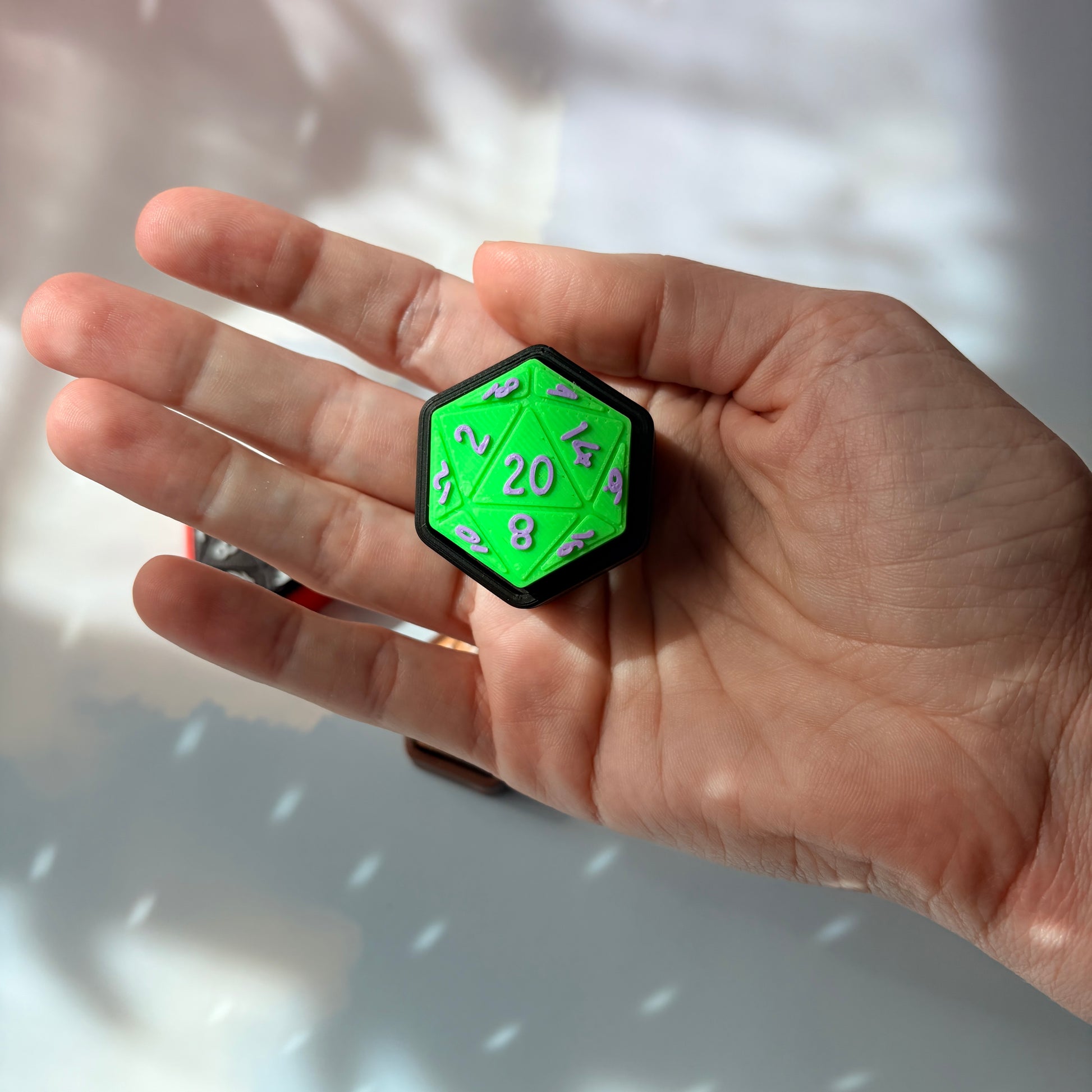3D printed D20 fidget available clicky or silent.