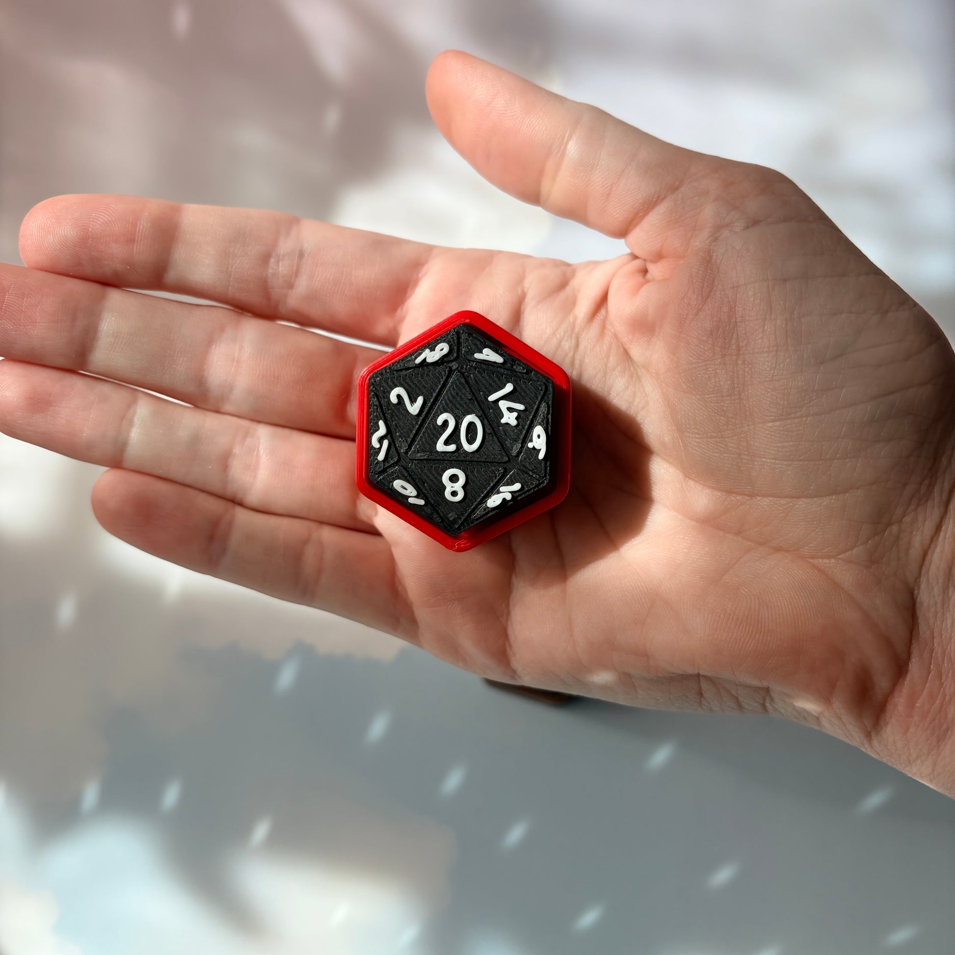 3D printed D20 fidget available clicky or silent.
