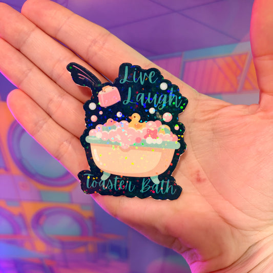 Holographic Live Laugh Toaster Bath vinyl sticker with bathtub, bubbles, rubber duck, and flying toaster.