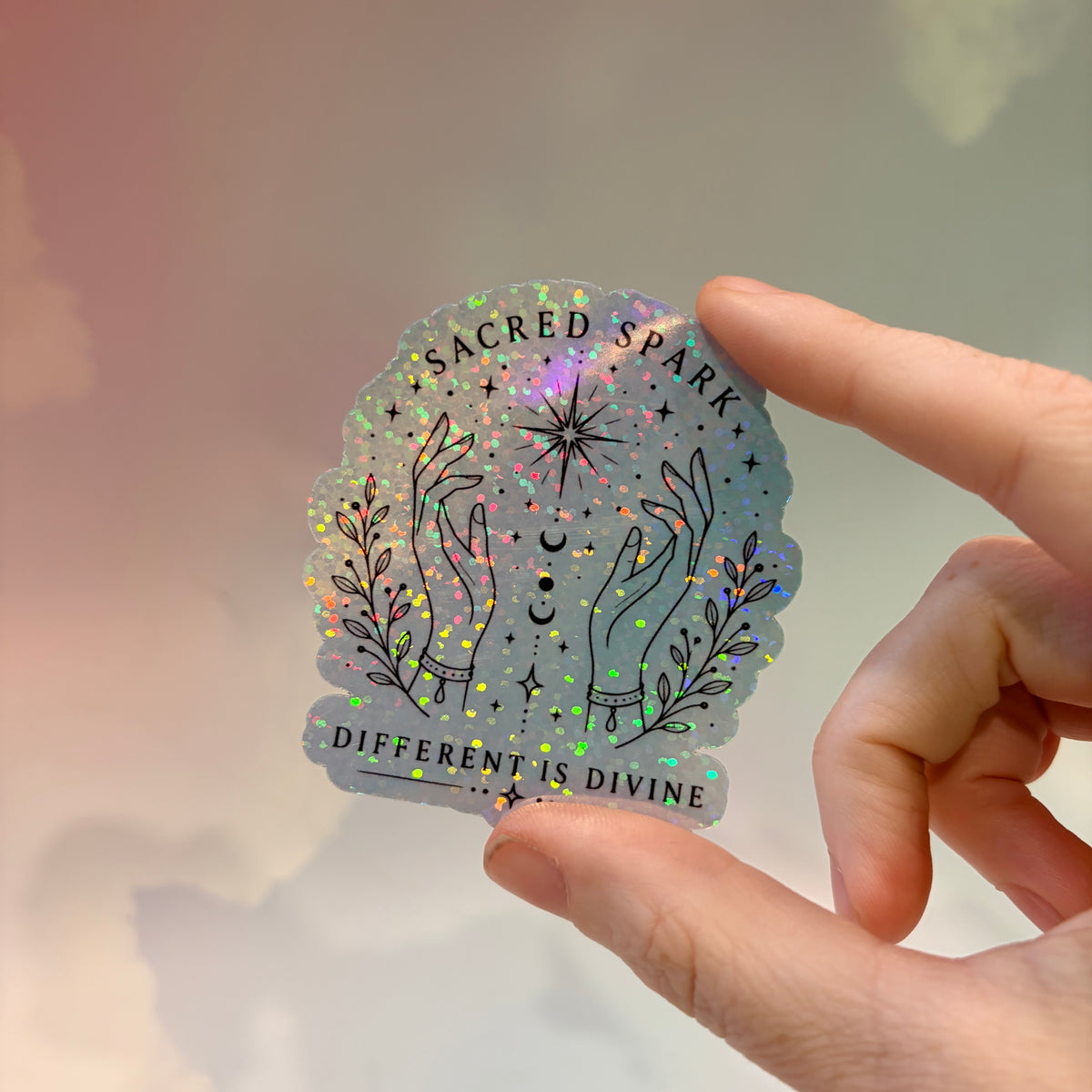 Holographic neurodivergent witchy sticker made from water-resistant vinyl, approximately 2.75 inches, featuring magical designs and neurodivergent humor.