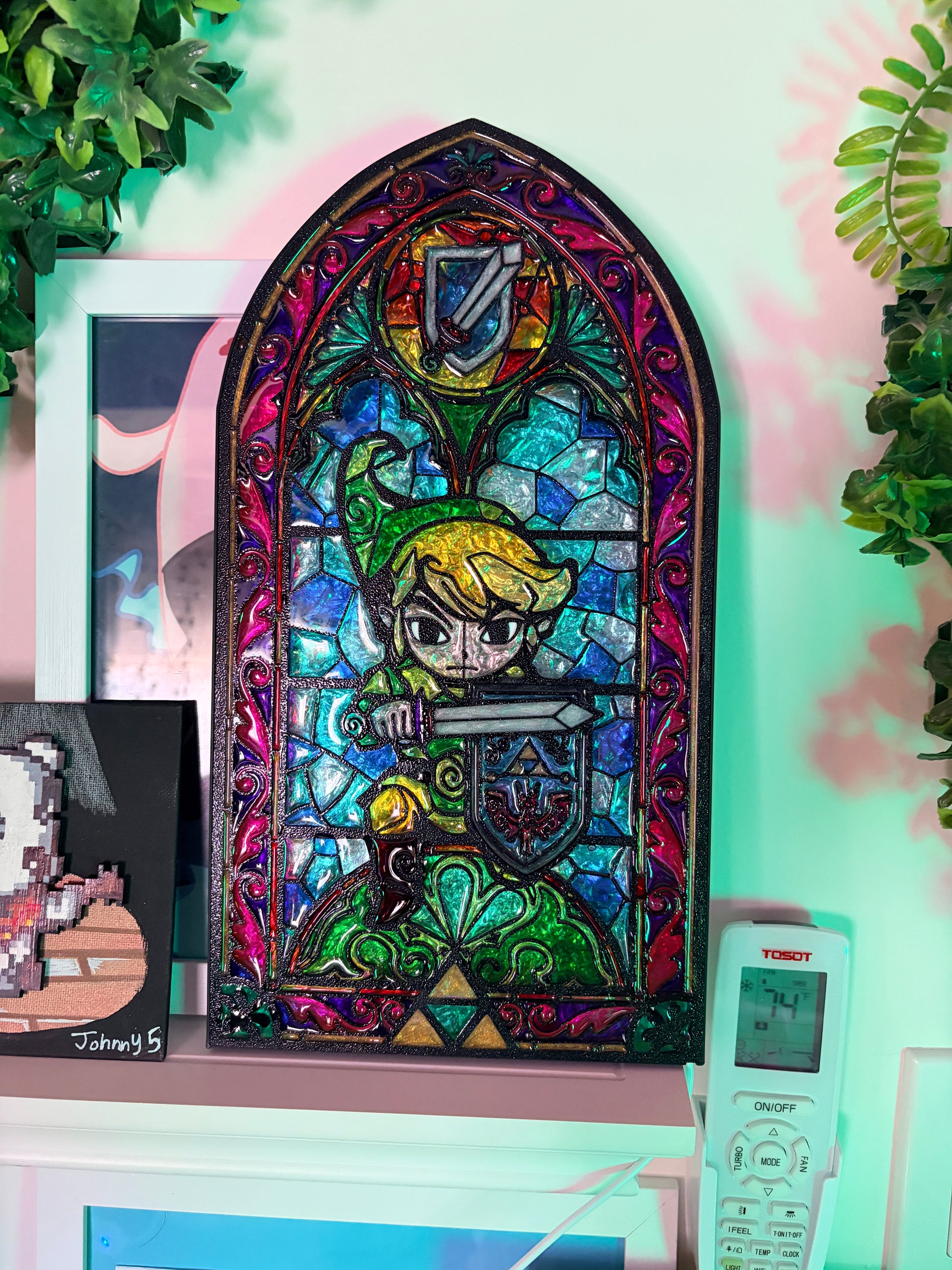 Handmade Zelda-inspired stained glass window light featuring hand-tinted resin artwork in a 3D printed frame with glowing interior LED lighting.