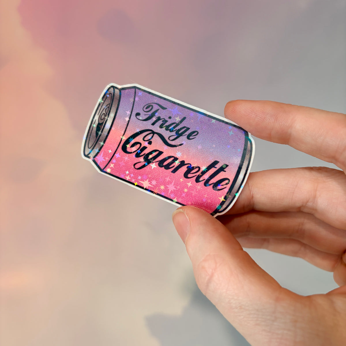Holographic water-resistant vinyl sticker featuring a soda can with the phrase “Fridge Cigarette” in bold lettering.