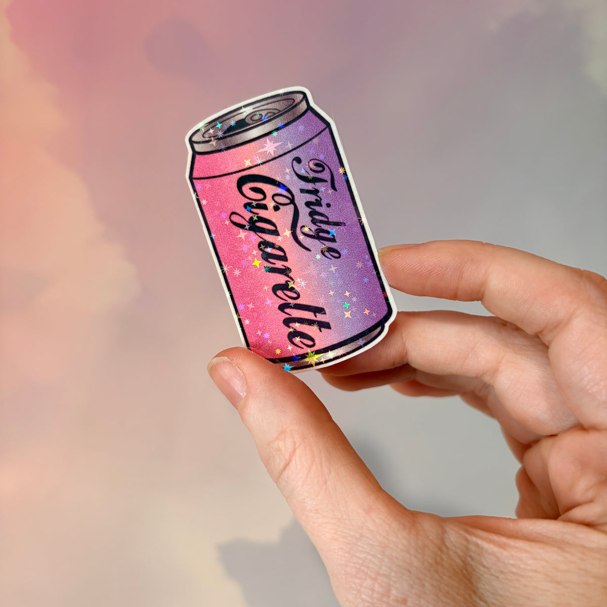 Holographic water-resistant vinyl sticker featuring a soda can with the phrase “Fridge Cigarette” in bold lettering.