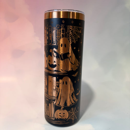 20oz laser engraved skinny tumbler featuring Halloween books, ghosts, bats, and spiderwebs. Perfect spooky drinkware for witchy book lovers and gothic décor fans.