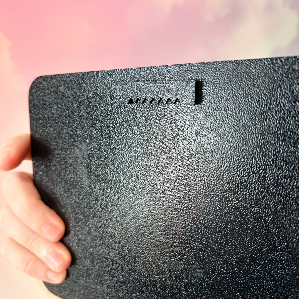 A rectangular 3D printed decorative sign featuring the phrase “You Can’t Spell Women Without Omen” in raised white lettering against a black background.