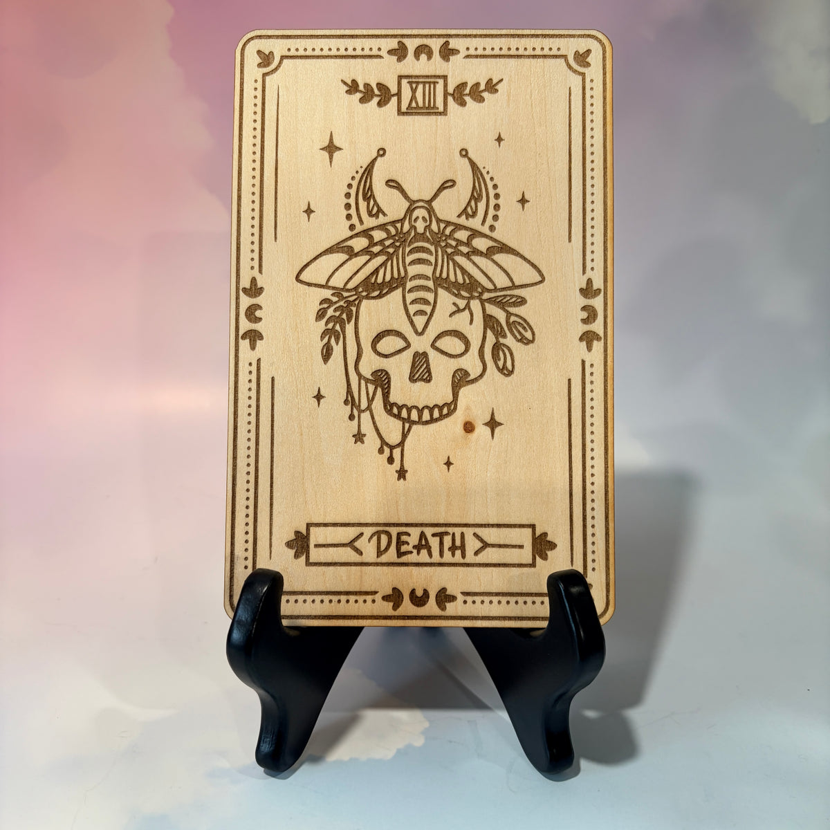 Laser-engraved wooden tarot card made from 3mm basswood, approximately 7 x 5 inches. Available in all 22 Major Arcana designs with customizable colors and an optional display stand for an additional $2.
