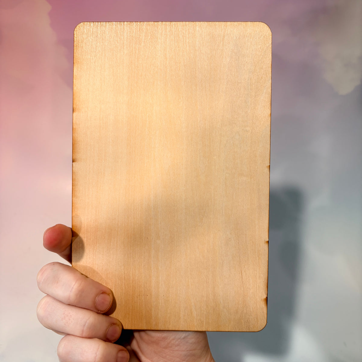 Laser-engraved wooden tarot card made from 3mm basswood, approximately 7 x 5 inches. Available in all 22 Major Arcana designs with customizable colors and an optional display stand for an additional $2.
