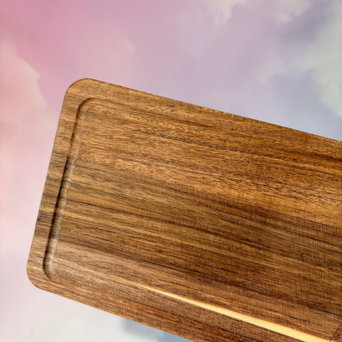 Personalized mini acacia wood charcuterie board with custom laser engraving, approximately 9.5 x 4.7 inches. Includes two serving tools, standard or cursive font options, and gift wrapping for a ready-to-give present.
