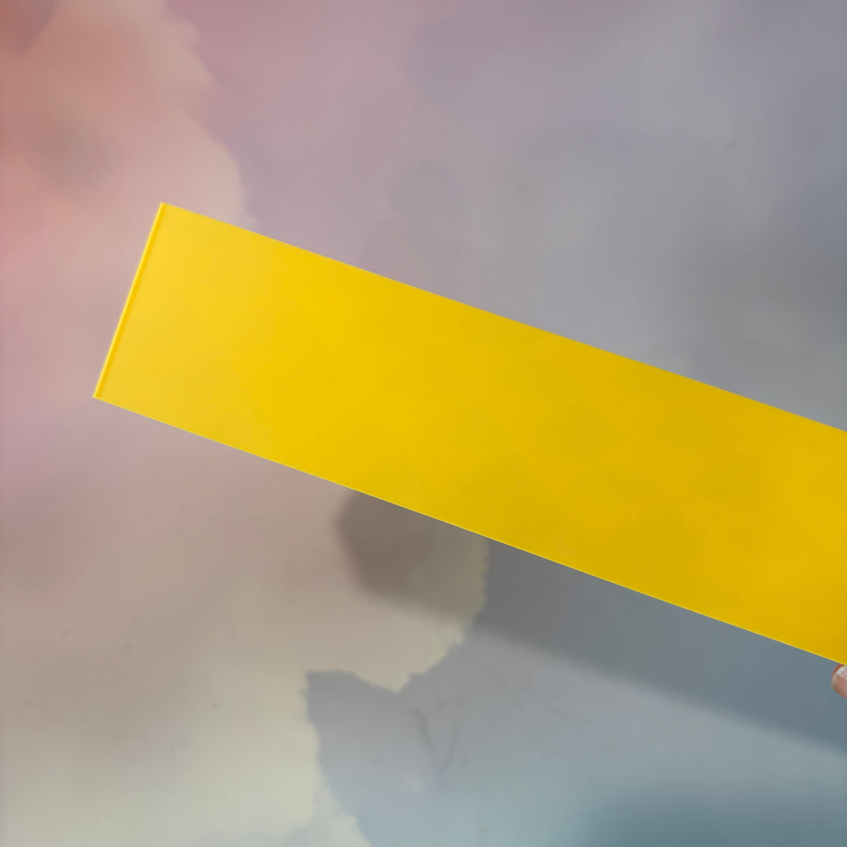 Oversized 3D printed novelty stick of butter, approximately 8.5 inches long, featuring classic tablespoon measurement lines, Grade AA labeling, and net weight details. Whimsical food-themed decor for kitchens and farmhouse-style homes.