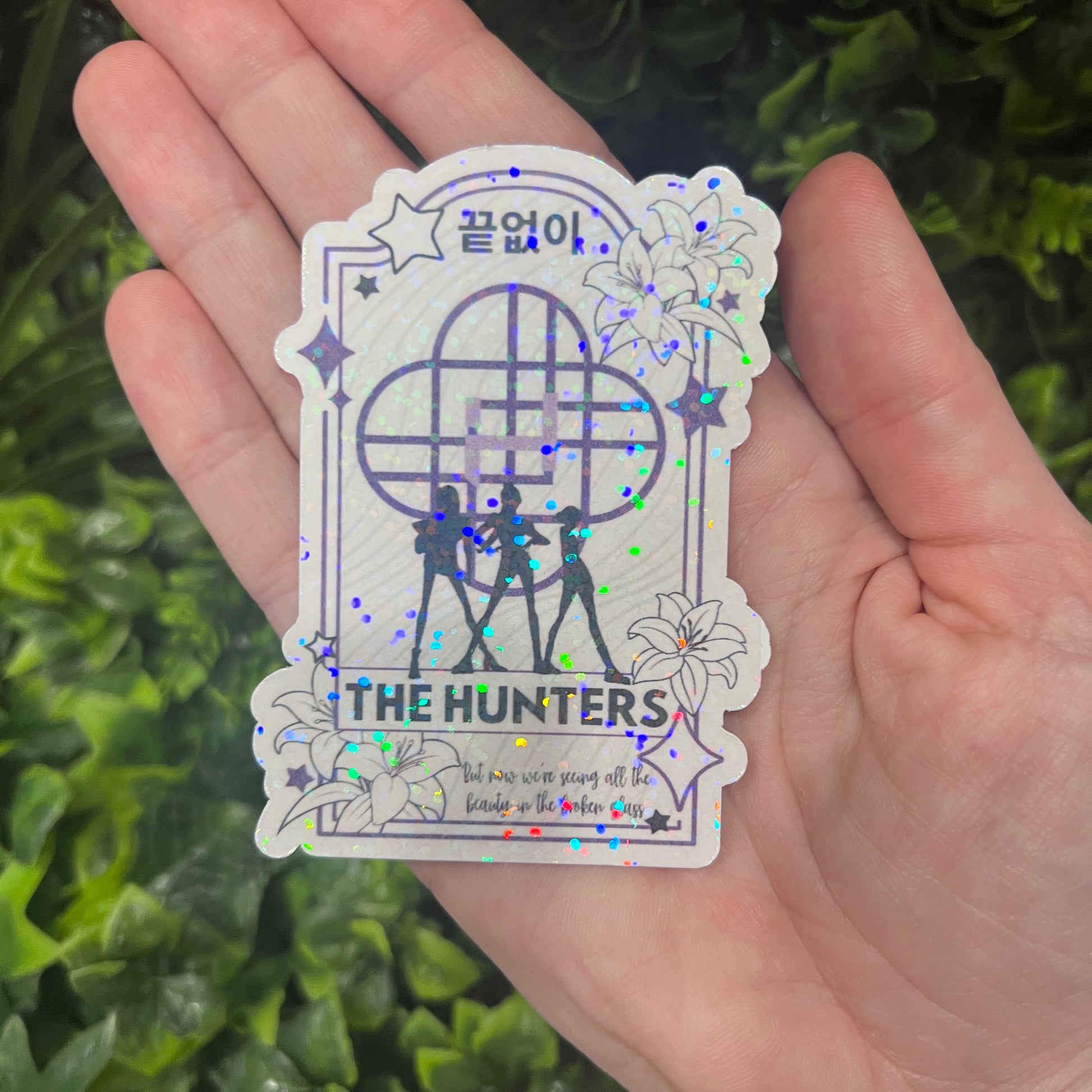 Holographic vinyl tarot sticker set featuring KPOP demon hunter characters: Lovers, Idol, Hunters, and Messengers. Vibrant, 3-inch water-resistant decals. Featuring Huntrix, The Saja Boys, Derpy Tiger, and Rumi and Jinu.