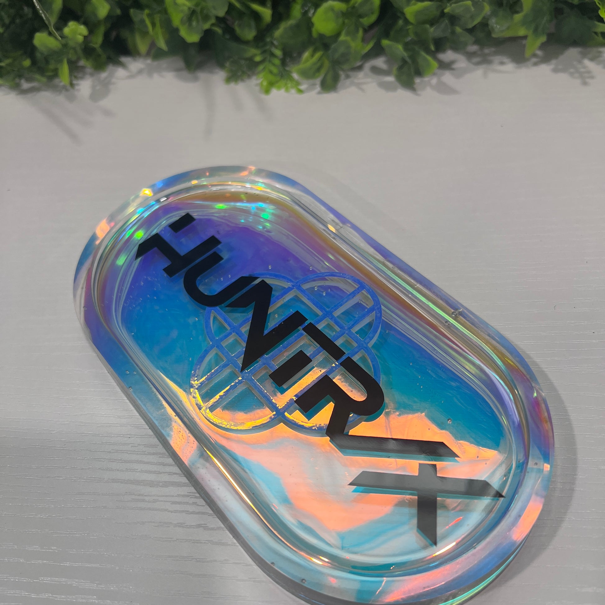 Handmade trinket tray featuring Saja Boys and Huntrix logos from KPOP Demon Hunters. Perfect for jewelry, small items, or decorative fandom display.