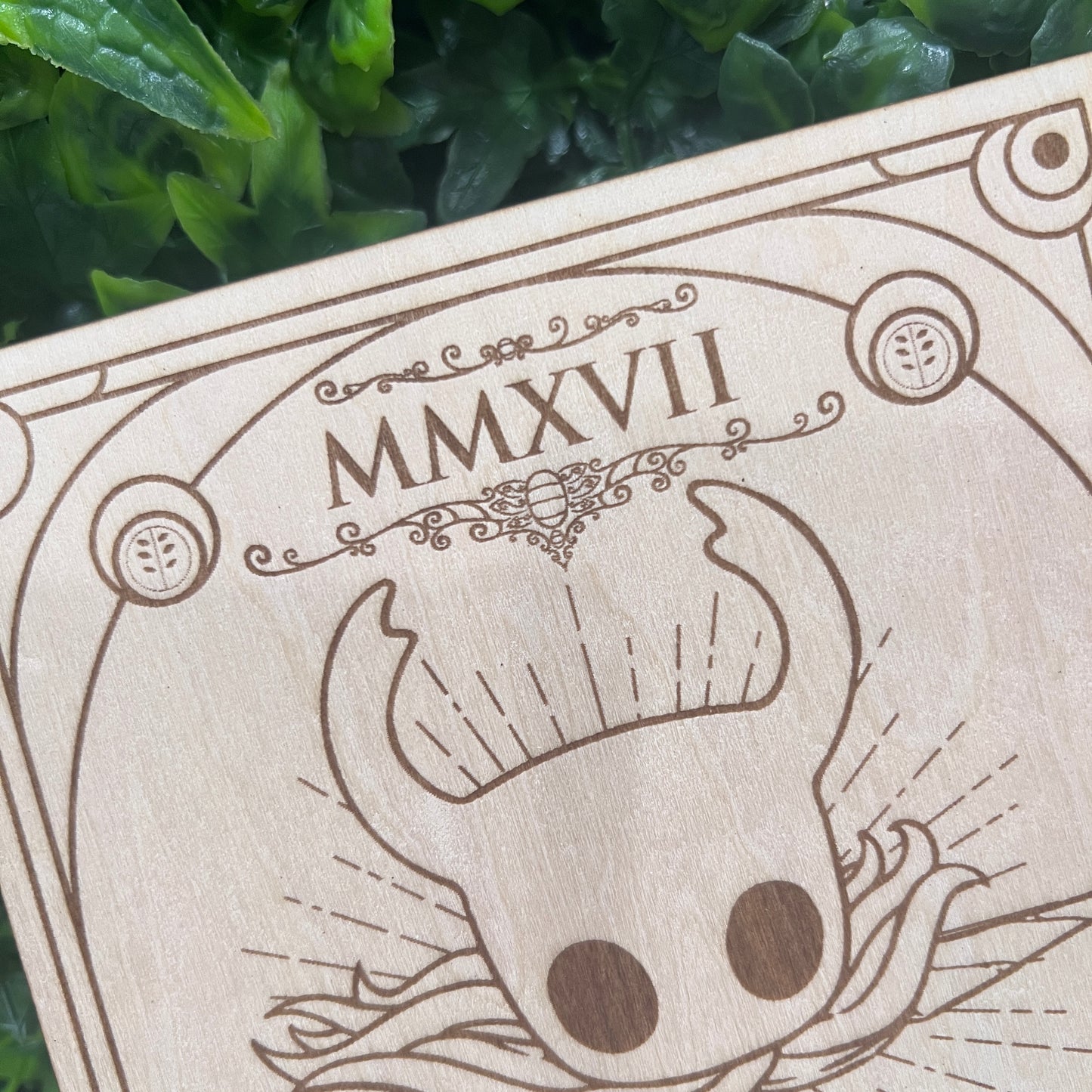Set of two laser engraved wood tarot cards featuring Hollow Knight as The Nail and Hornet as the Needle. Unique indie game fan art collectible.