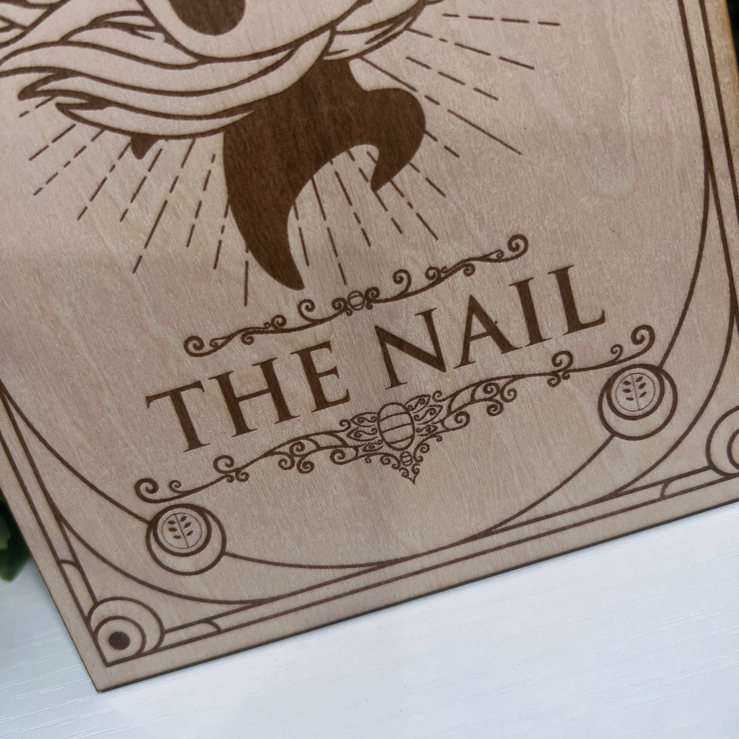 Set of two laser engraved wood tarot cards featuring Hollow Knight as The Nail and Hornet as the Needle. Unique indie game fan art collectible.