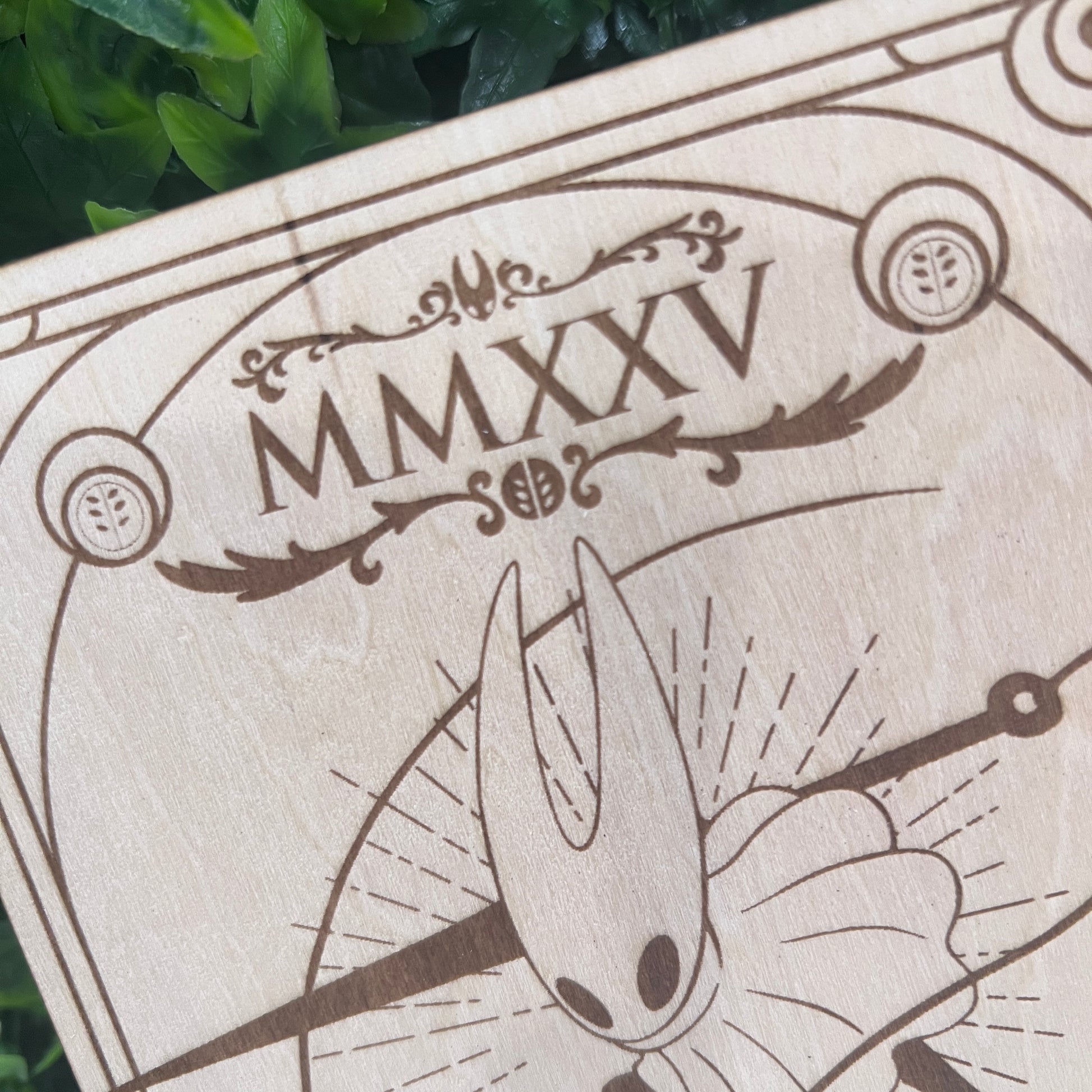 Set of two laser engraved wood tarot cards featuring Hollow Knight as The Nail and Hornet as the Needle. Unique indie game fan art collectible.