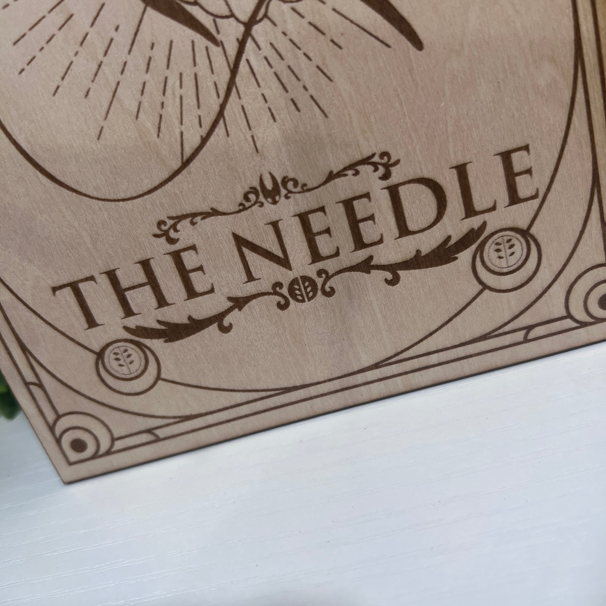 Set of two laser engraved wood tarot cards featuring Hollow Knight as The Nail and Hornet as the Needle. Unique indie game fan art collectible.