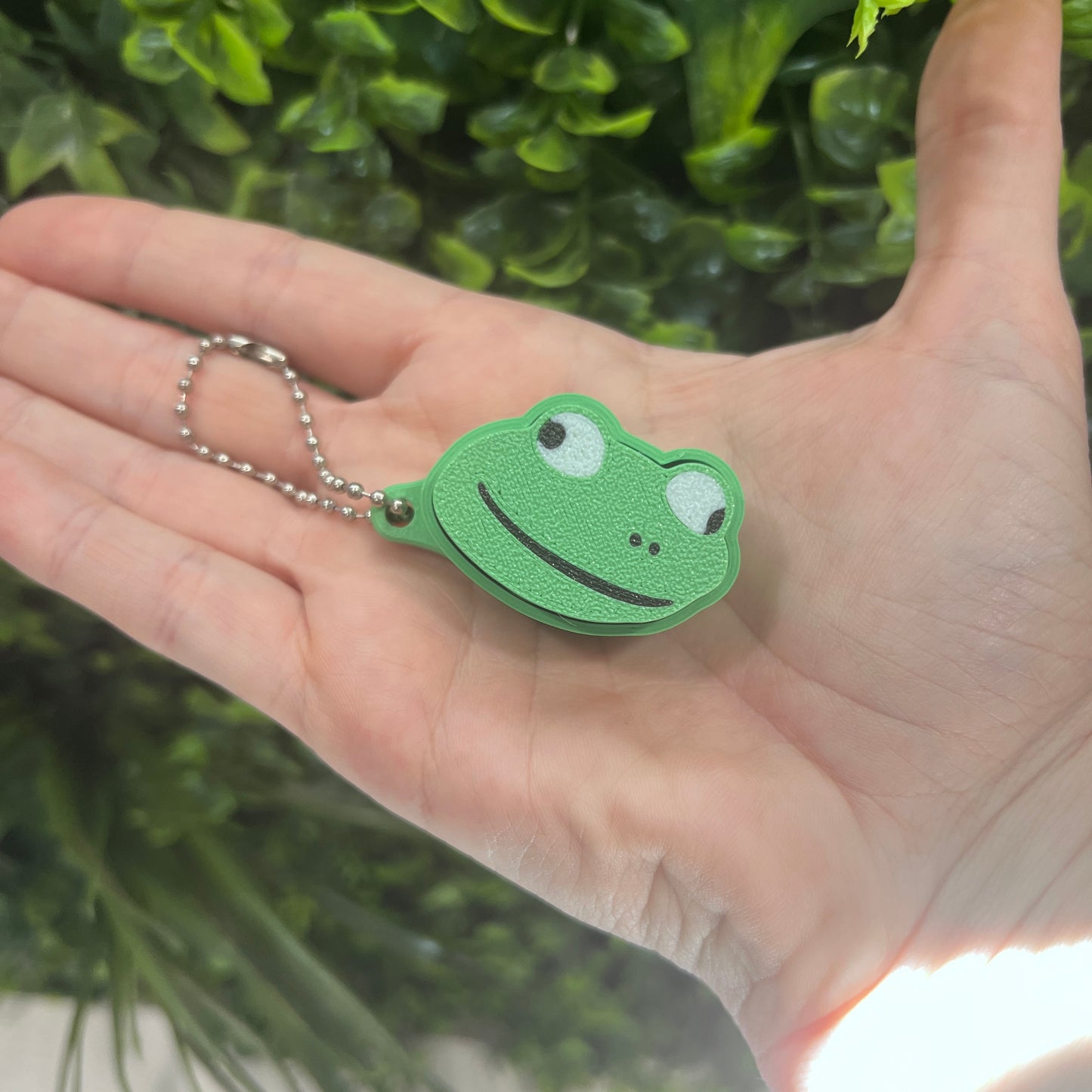 3D printed lizard meme clicker, a funny stress relief fidget toy and desk accessory. Perfect gamer gift and unique collectible for meme lovers.