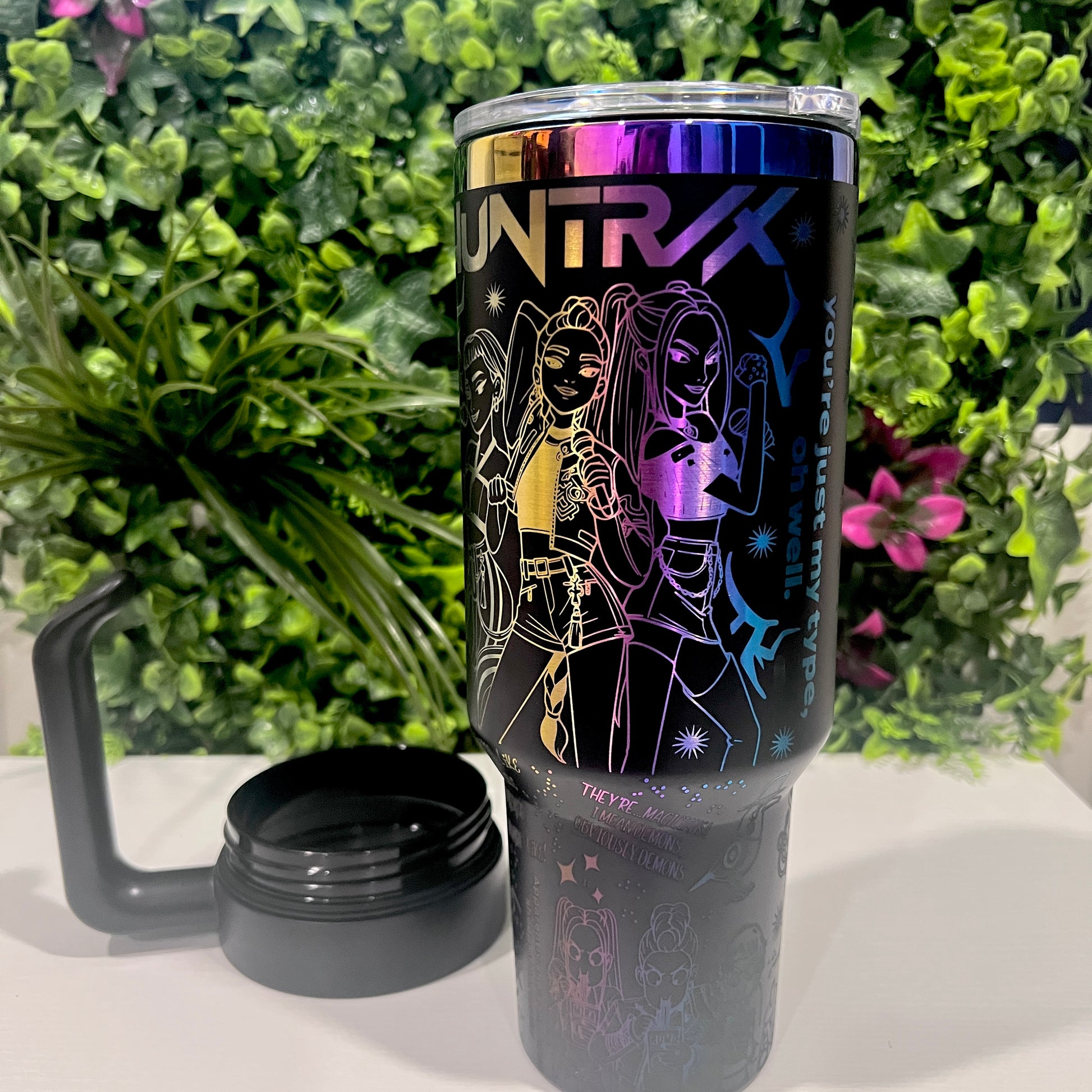 Laser engraved 40oz stainless steel tumbler with handle and straw featuring KPOP Demon Hunters design. Durable fandom drinkware for gamers and fans.