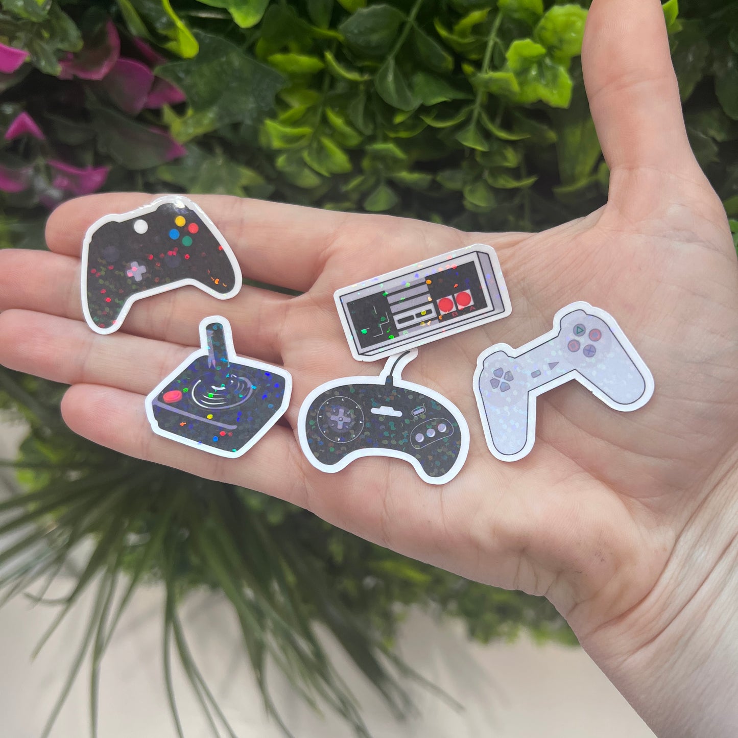 Set of holographic controller stickers for gamers. Shiny iridescent vinyl decals perfect for laptops, water bottles, consoles, and gaming accessories.