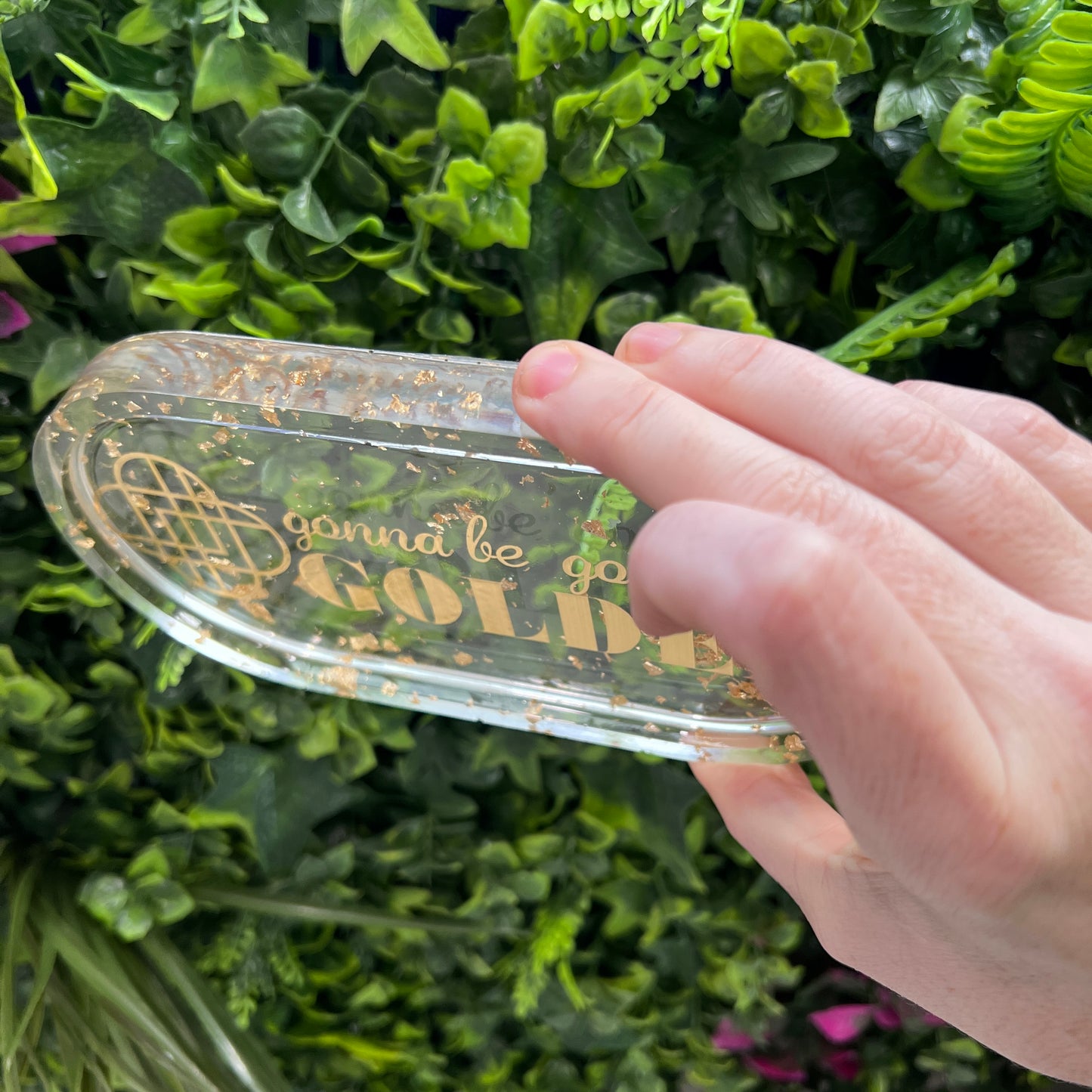 Handmade resin trinket tray with gold leaf and the quote “Gonna Be Gonna Be Golden.” Kpop Demon Hunters–inspired jewelry dish, perfect for gifts or décor.