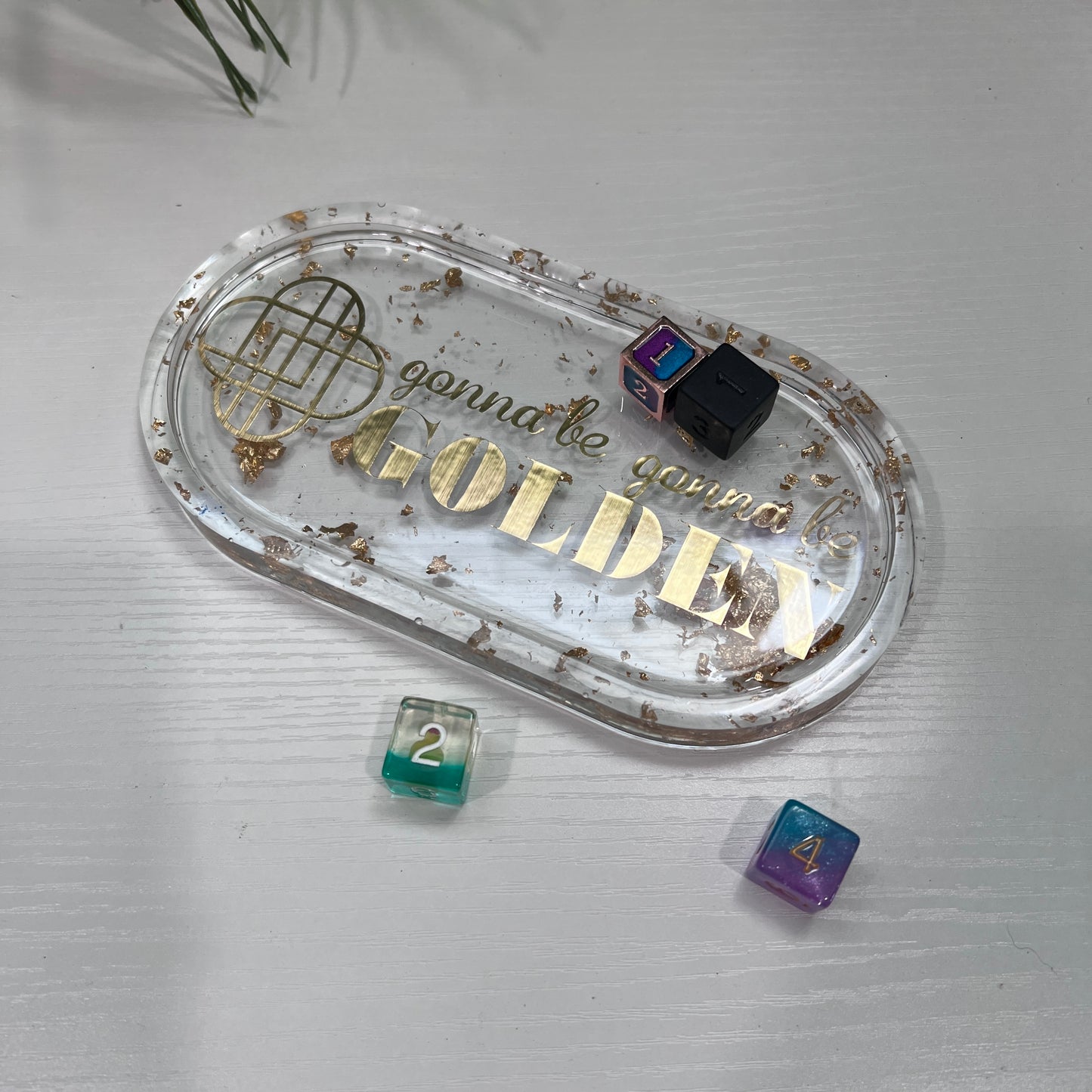 Handmade resin trinket tray with gold leaf and the quote “Gonna Be Gonna Be Golden.” Kpop Demon Hunters–inspired jewelry dish, perfect for gifts or décor.