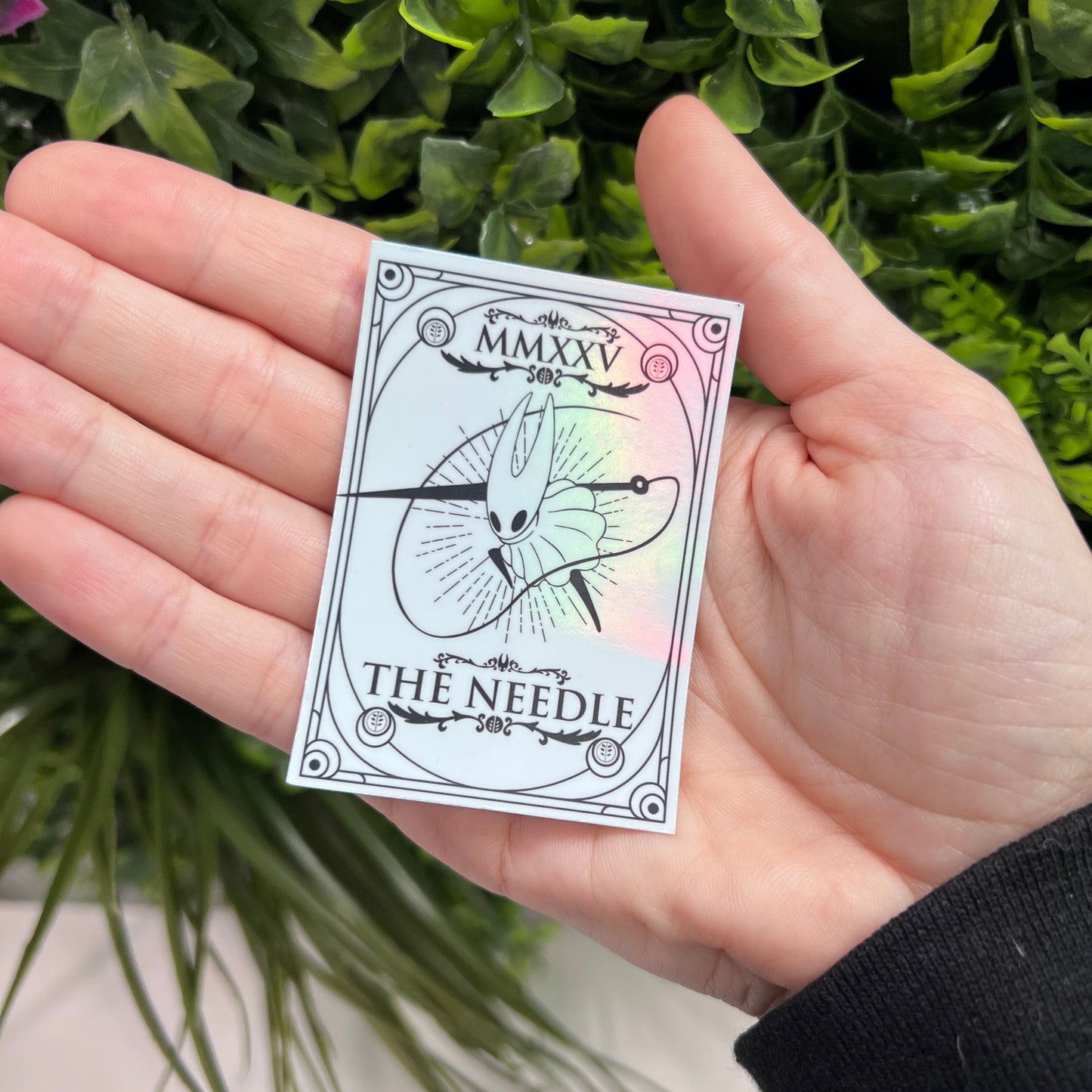 Silver Holographic tarot card stickers featuring Hollow Knight as The Nail and Hornet as the Needle. Unique indie game fan art collectible.