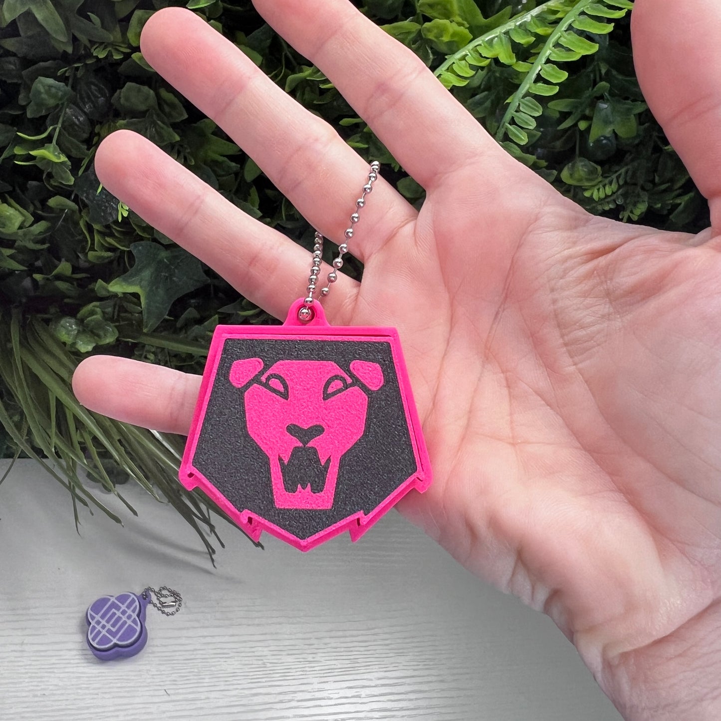 3D Printed Kpop Demon Hunters clickers featuring the Huntrix and Saja Boys logos. Perfect for fans, gamers, and collectors who love fidget toys and Kpop-inspired accessories.