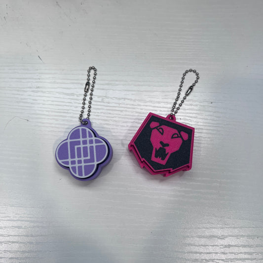 3D Printed Kpop Demon Hunters clickers featuring the Huntrix and Saja Boys logos. Perfect for fans, gamers, and collectors who love fidget toys and Kpop-inspired accessories.