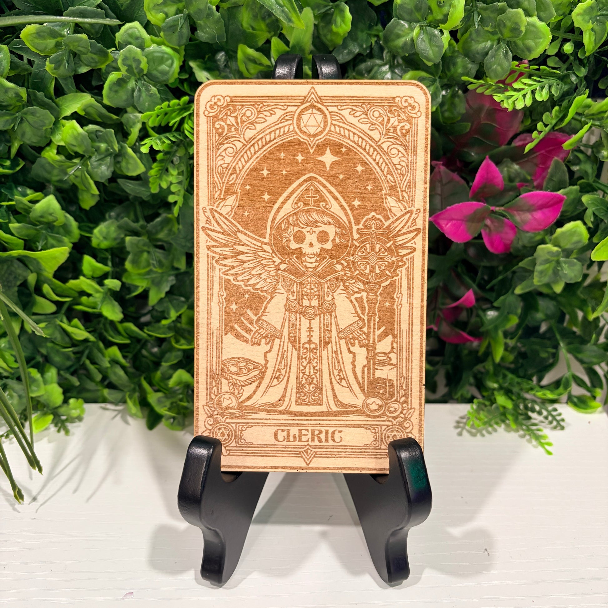 Laser engraved 3mm basswood tarot cards featuring a cleric class design. Intricate fantasy artwork with dice, magic symbols, and ornate gothic detailing.