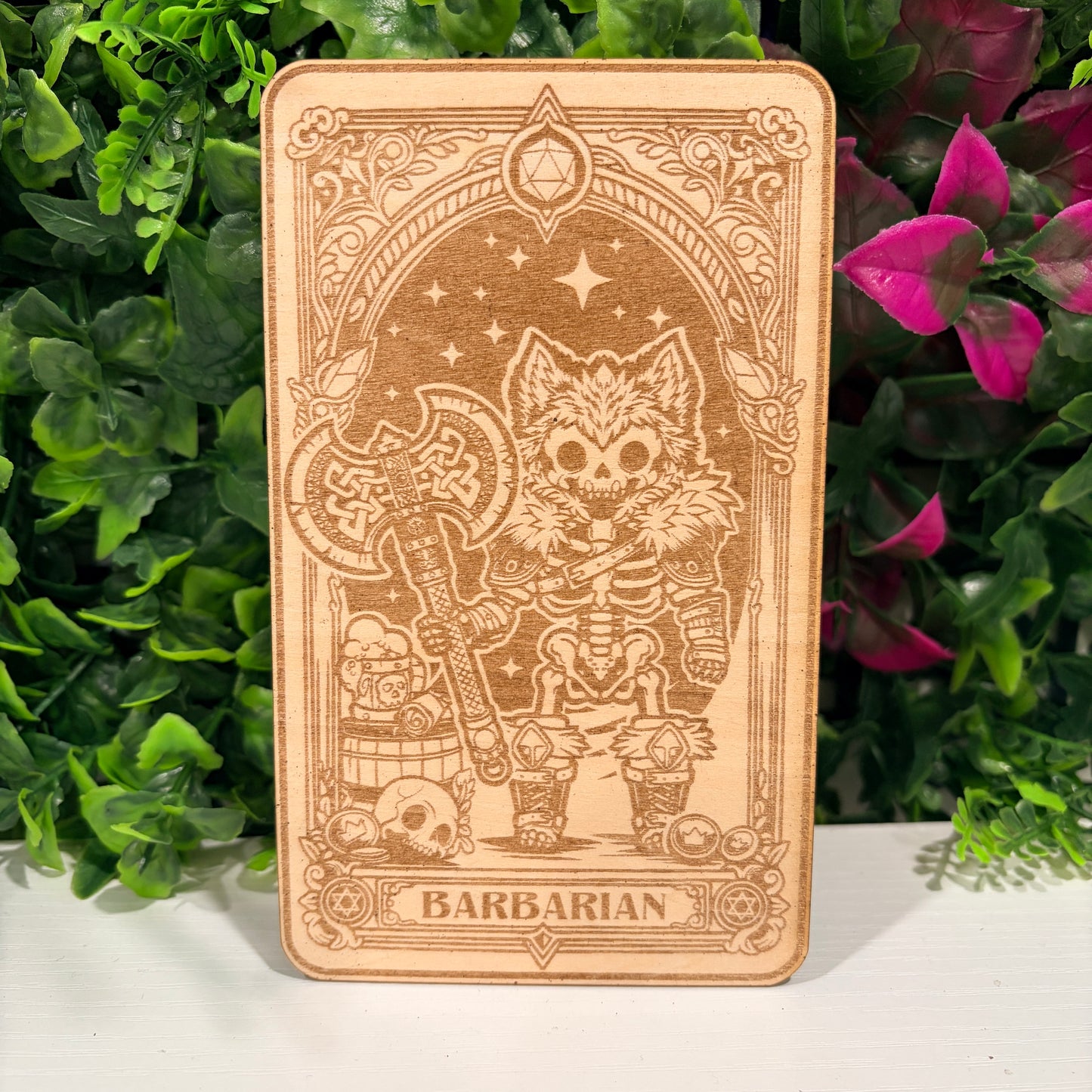 Laser engraved 3mm basswood tarot cards featuring a Barbarian class design from Dungeons and Dragons. Intricate fantasy artwork with dice, magic symbols, and ornate gothic detailing.