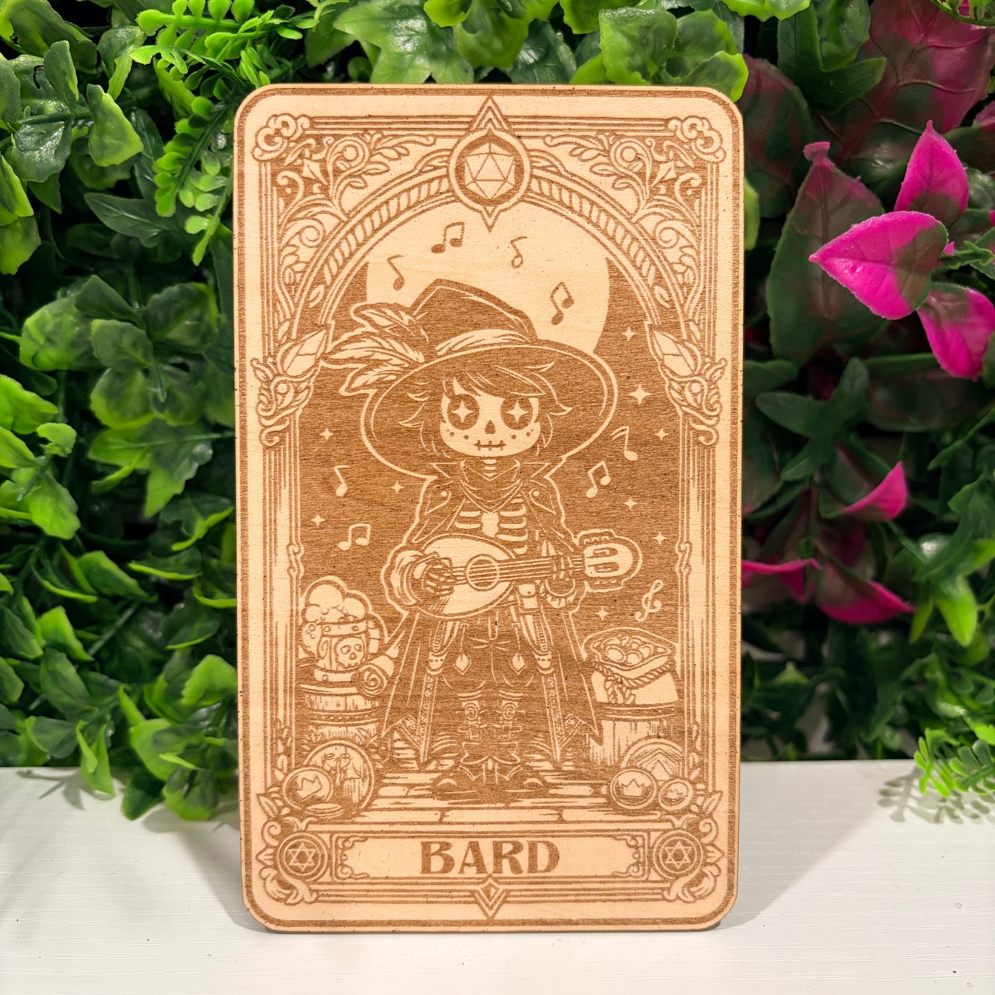 Laser engraved 3mm basswood tarot cards featuring a Bard class design from Dungeons and Dragons. Intricate fantasy artwork with dice, magic symbols, and ornate gothic detailing.