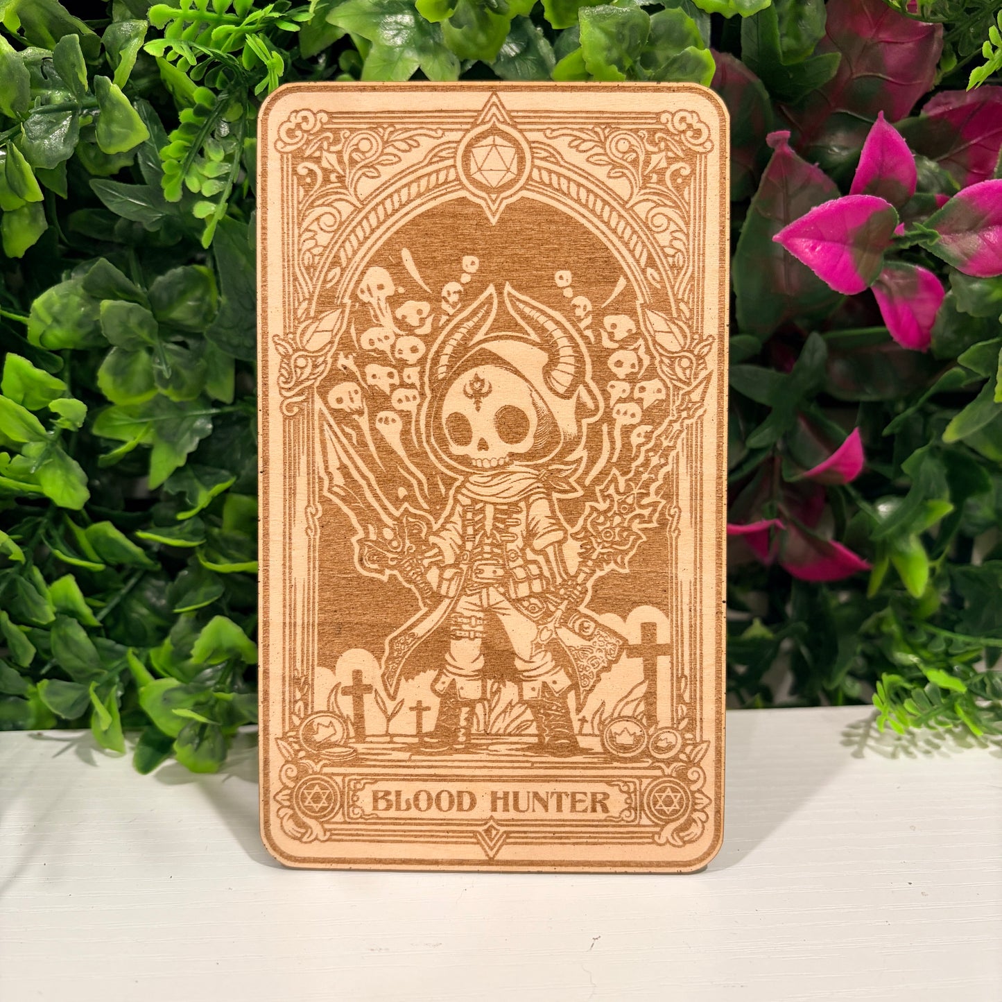 Laser engraved 3mm basswood tarot cards featuring a Blood Hunter class design from Dungeons and Dragons. Intricate fantasy artwork with dice, magic symbols, and ornate gothic detailing.