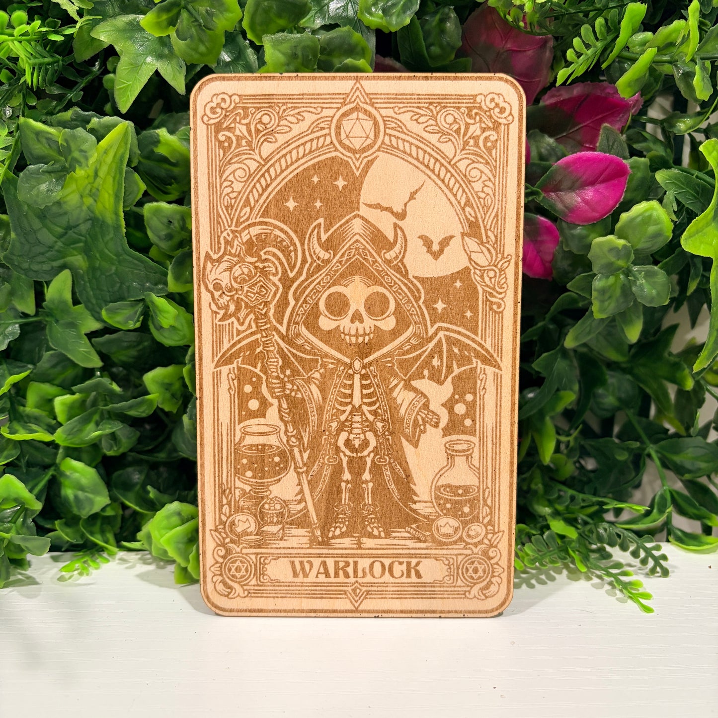 Laser engraved 3mm basswood tarot cards featuring a Warlock class design from Dungeons and Dragons. Intricate fantasy artwork with dice, magic symbols, and ornate gothic detailing.