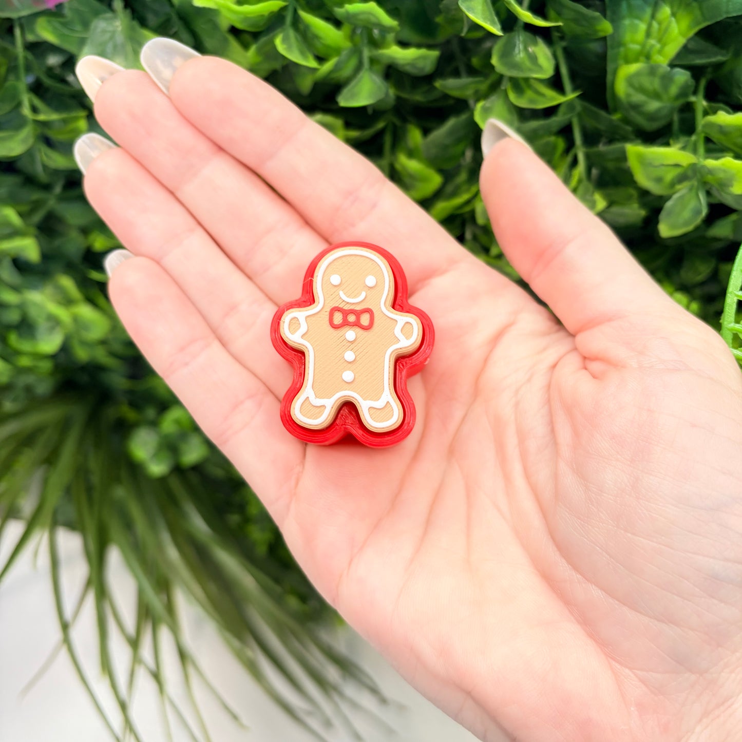 Holiday gingerbread fidget clicker toy.